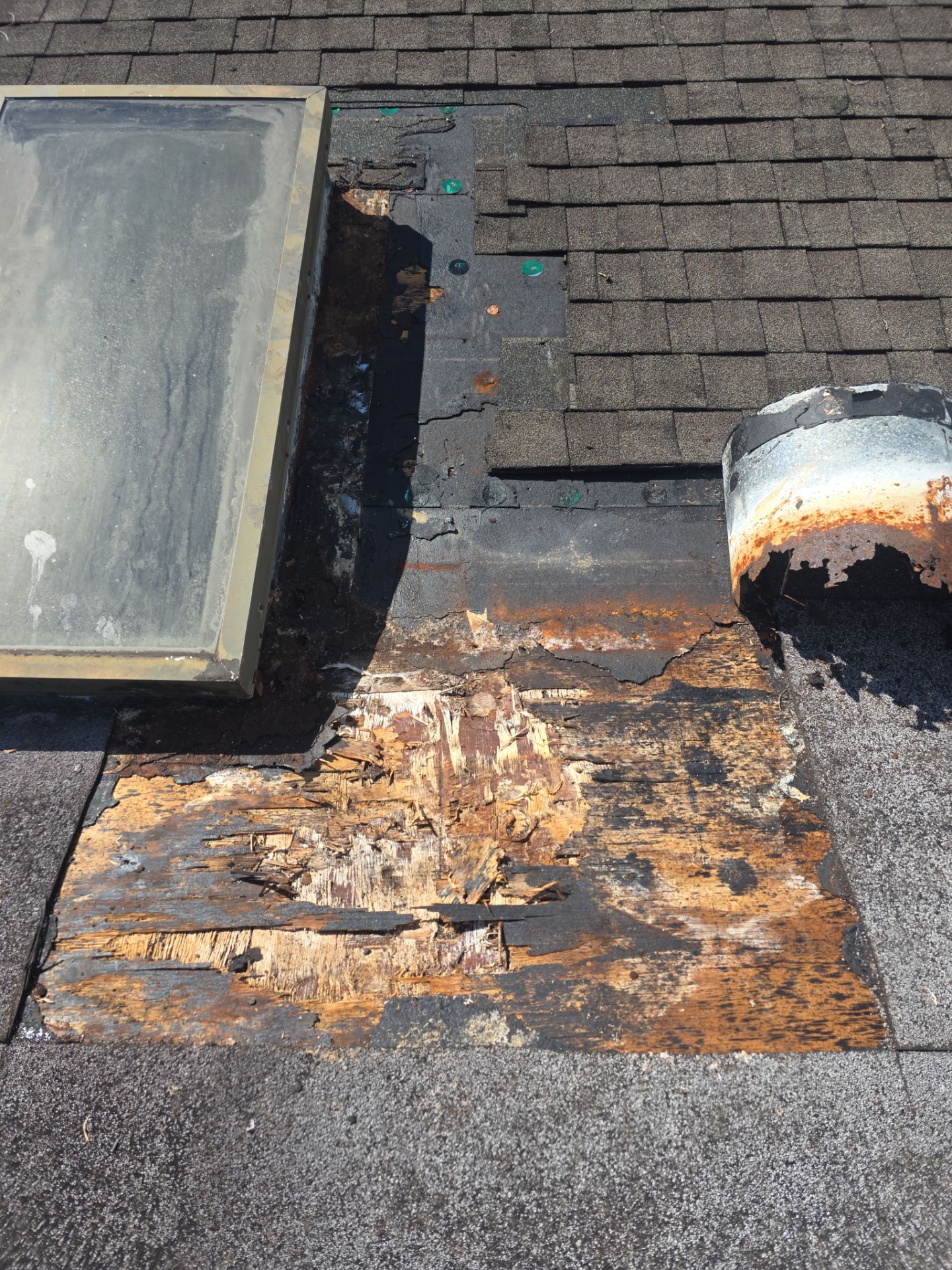 REPLACE NON APPROVED SKYLIGHT ALONG WITH CLOGED GUTTER by Morton Roofing, Inc.