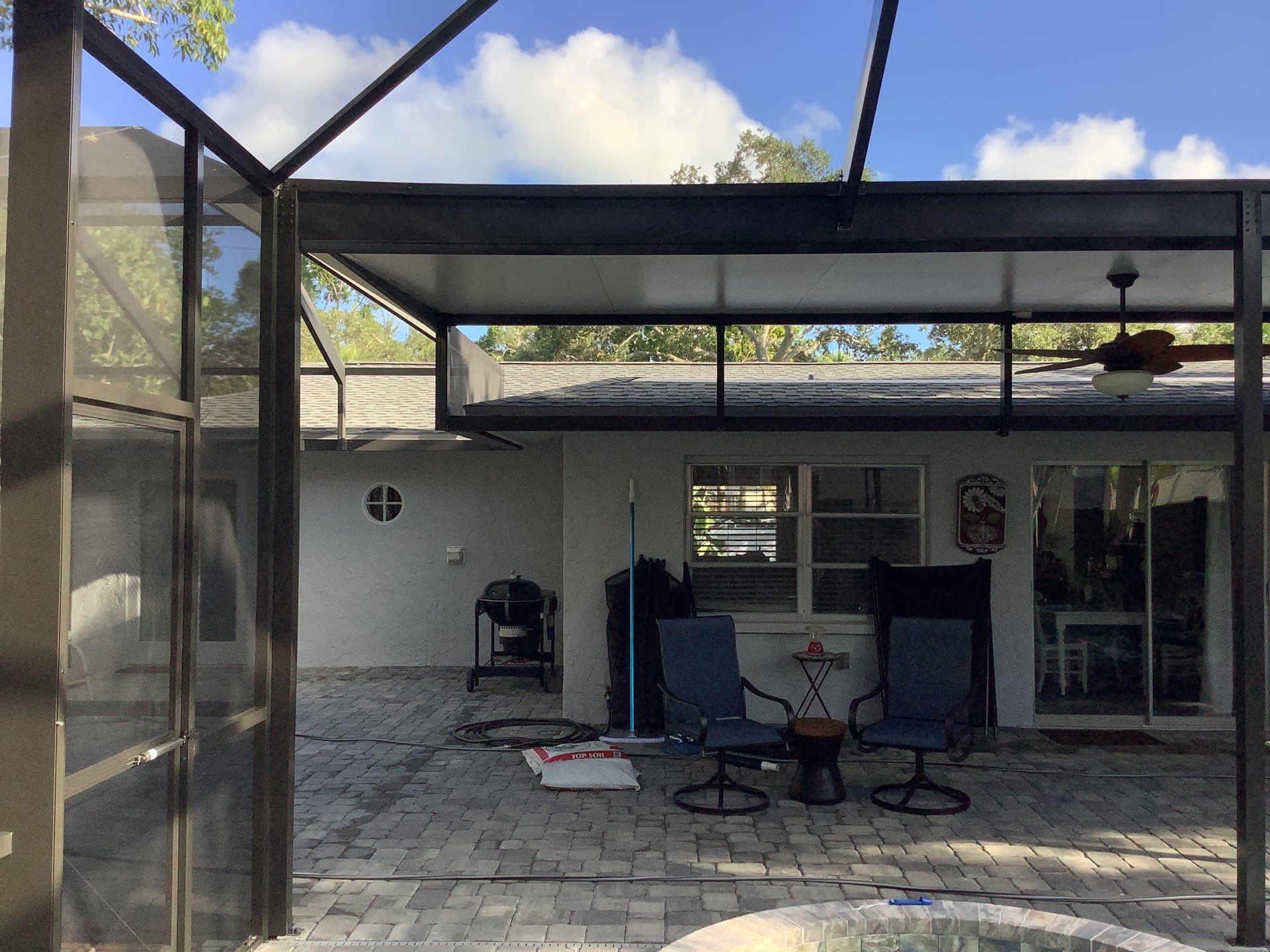 Black Seamless Gutters Installation in Siesta Key FL by Gutter Professors