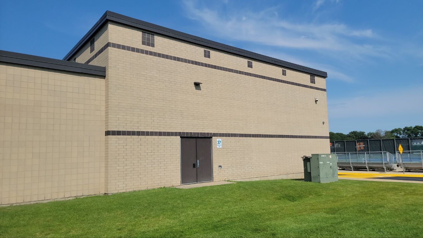 commercial pressure washing using Algaecide, soft wash soap by Northern Power Washing LLC.