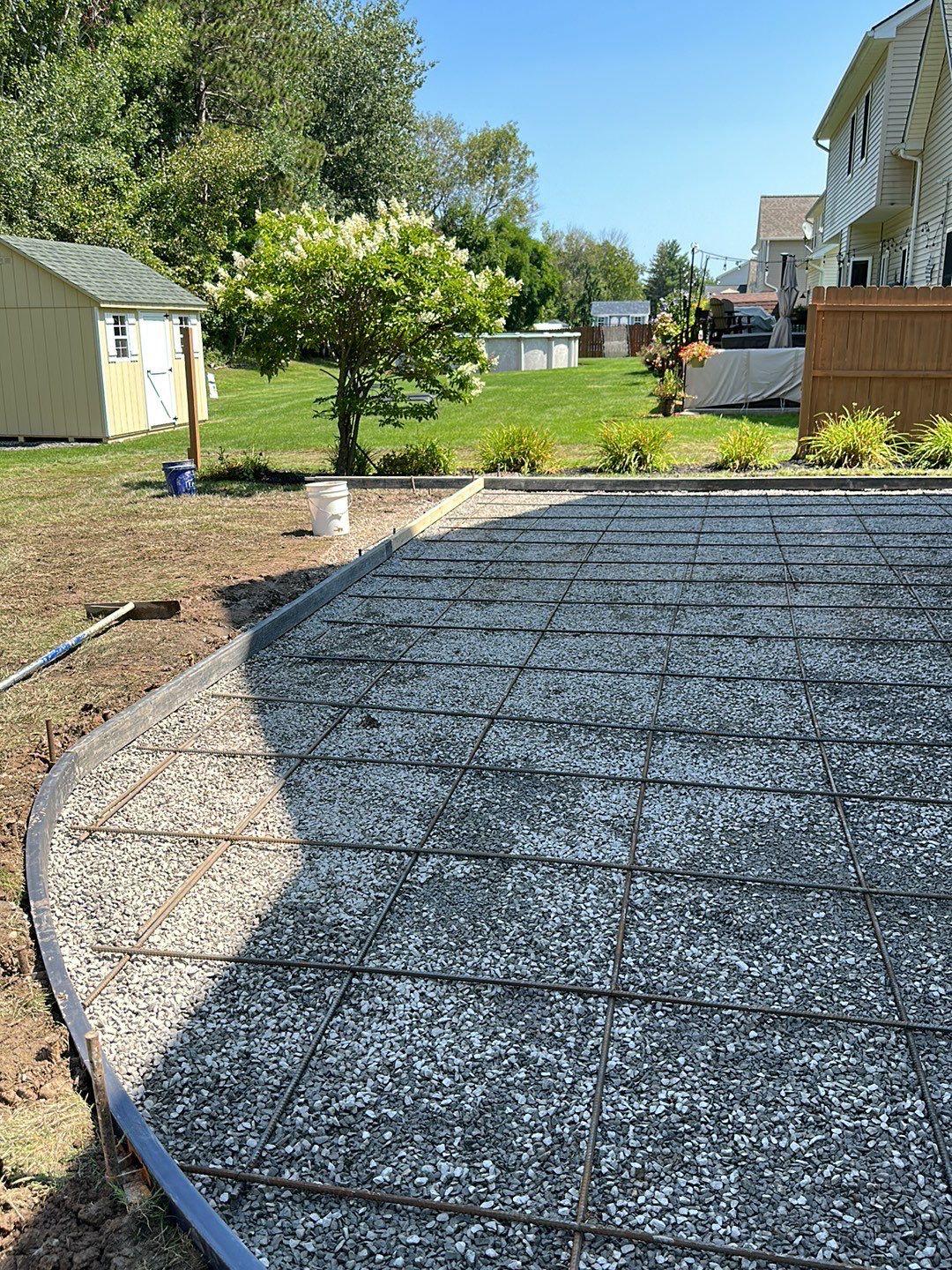 Wood Plank Stamped Concrete Patio  by NG Masonry & Construction LLC