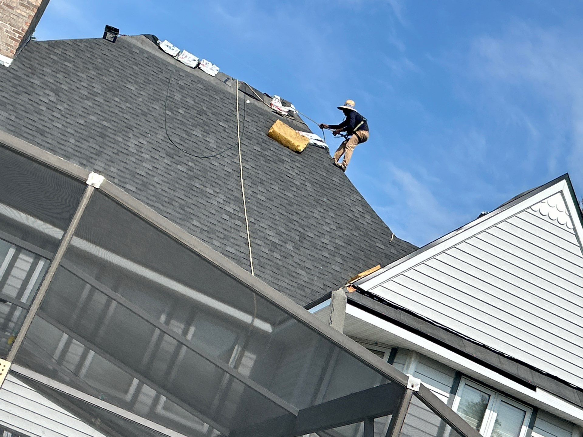 Residential Roofing Installation with Black Shadow Shingles in Clermont by Pinnacle Roofing Group
