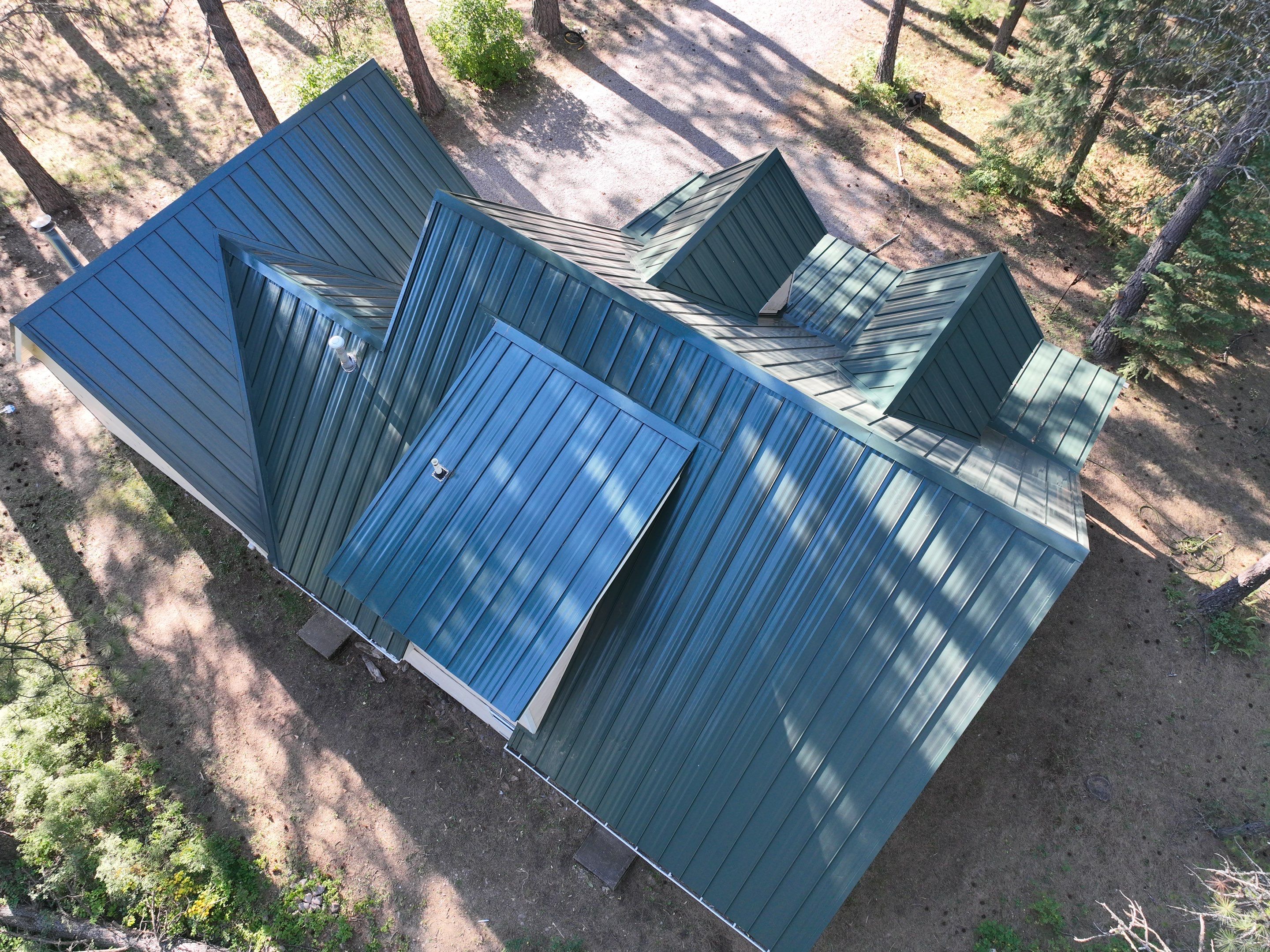 Green Snap Lock Standing Seam  by Montana Roofing Solutions