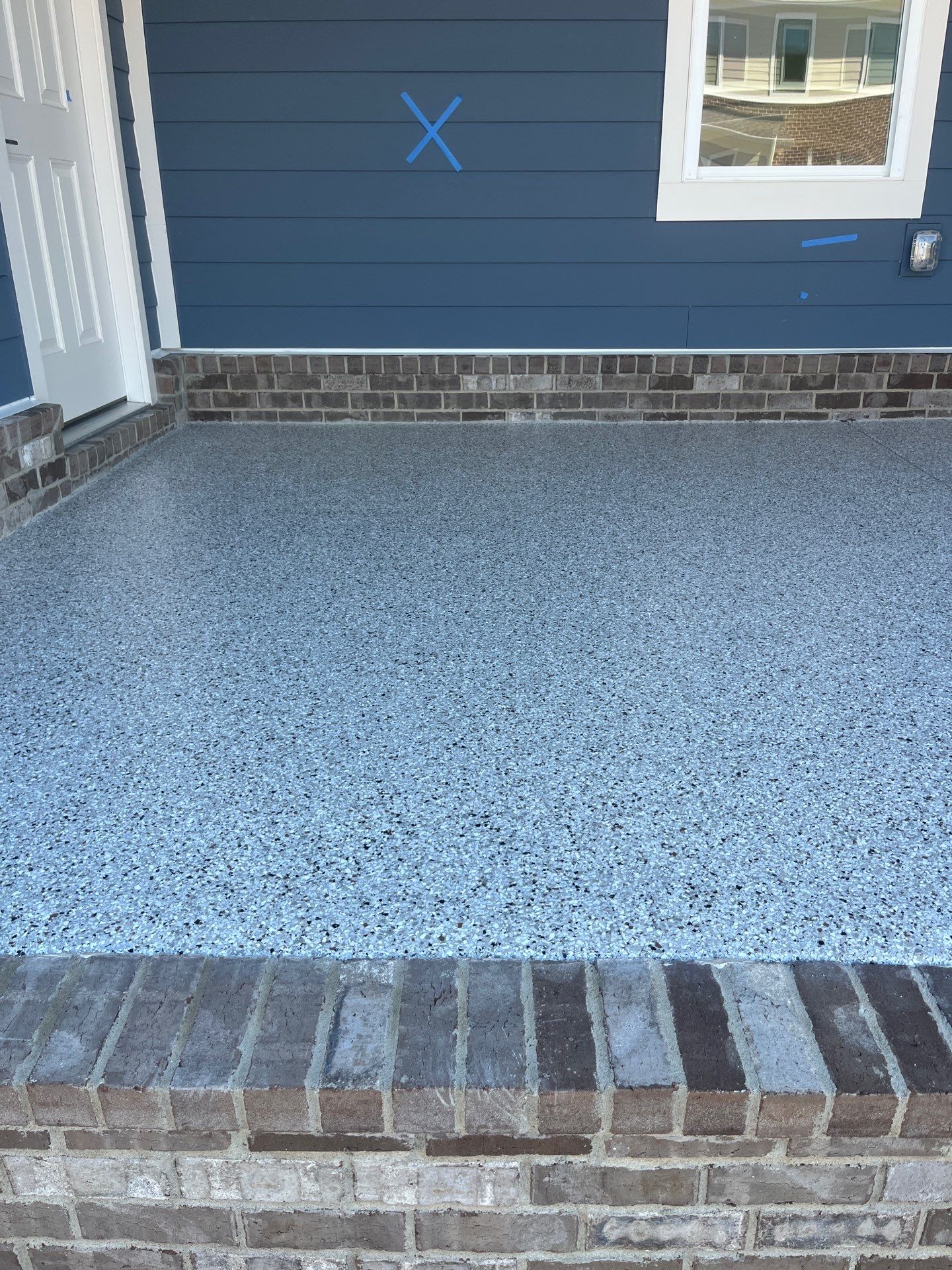 Patio Floor Coating using Coyote by My Garage Floor Guys