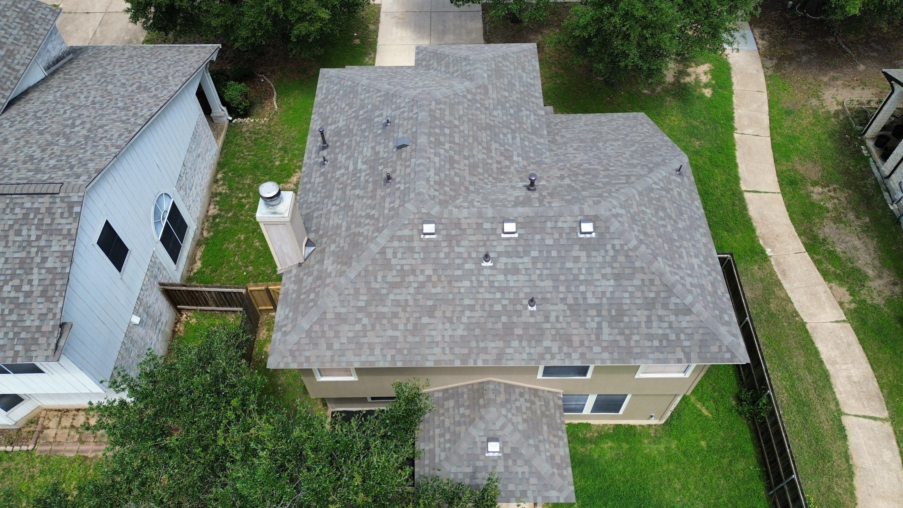 Roof Replacement & Chimney Cricket Upgrade in Cedar Park, TX by Kstylez Roofing & Construction