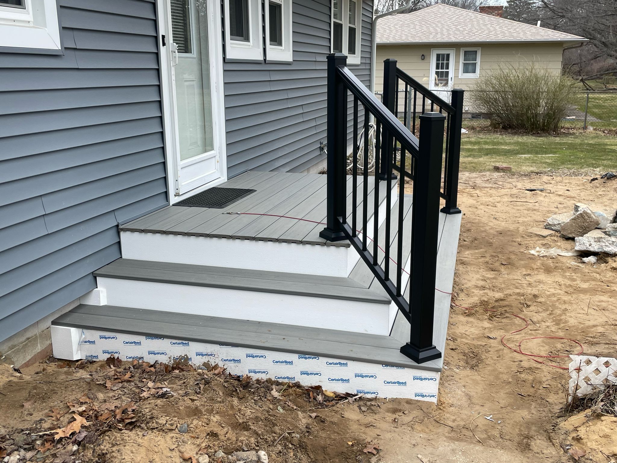 Siding, Front and Back Porch  by Avalon Roofing and Exteriors