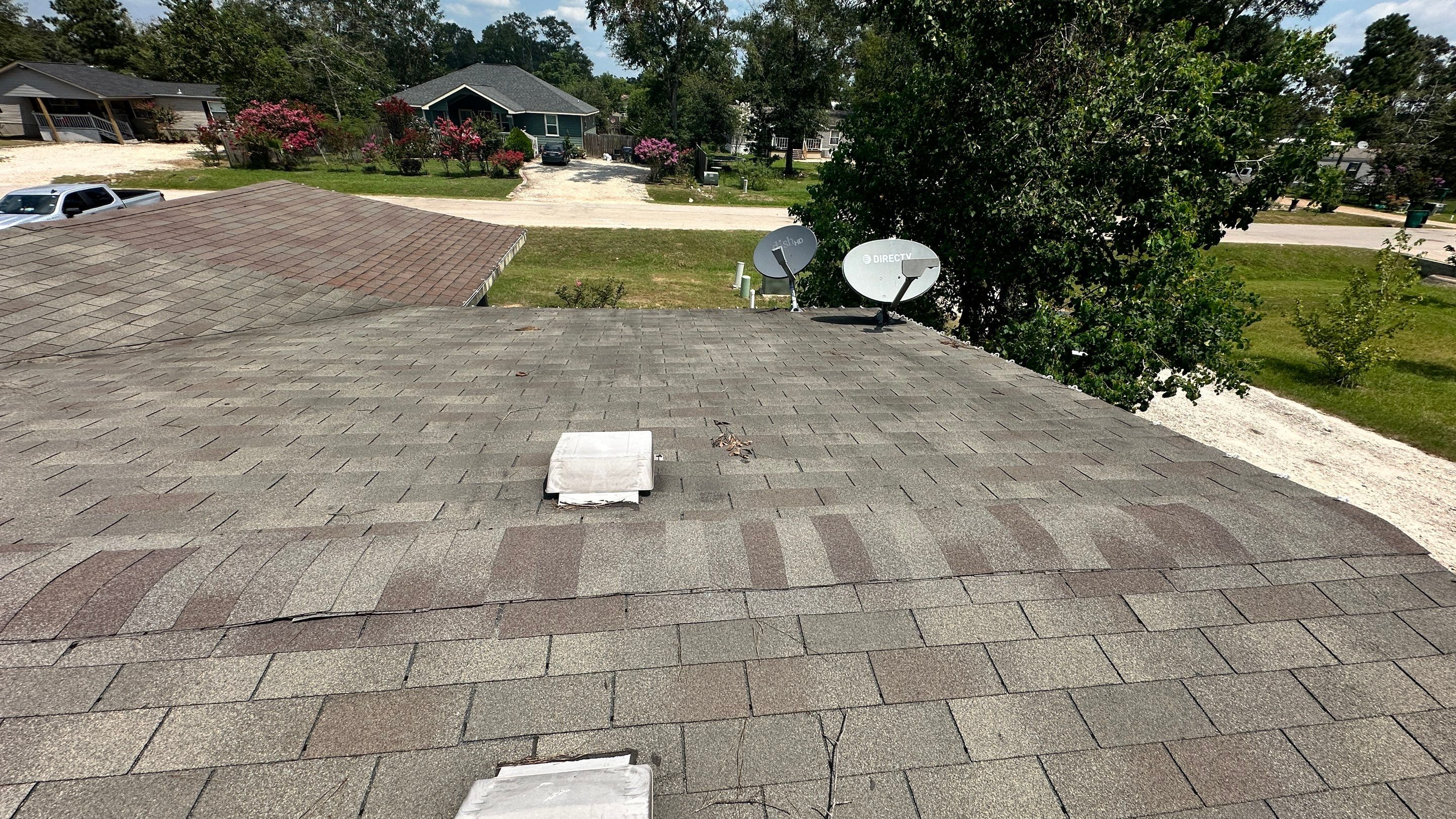 Roof Replacement with Deck Repairs & Flat-Roof Section — Conroe, TX by PL Roofing & SB Roofing, LLC.