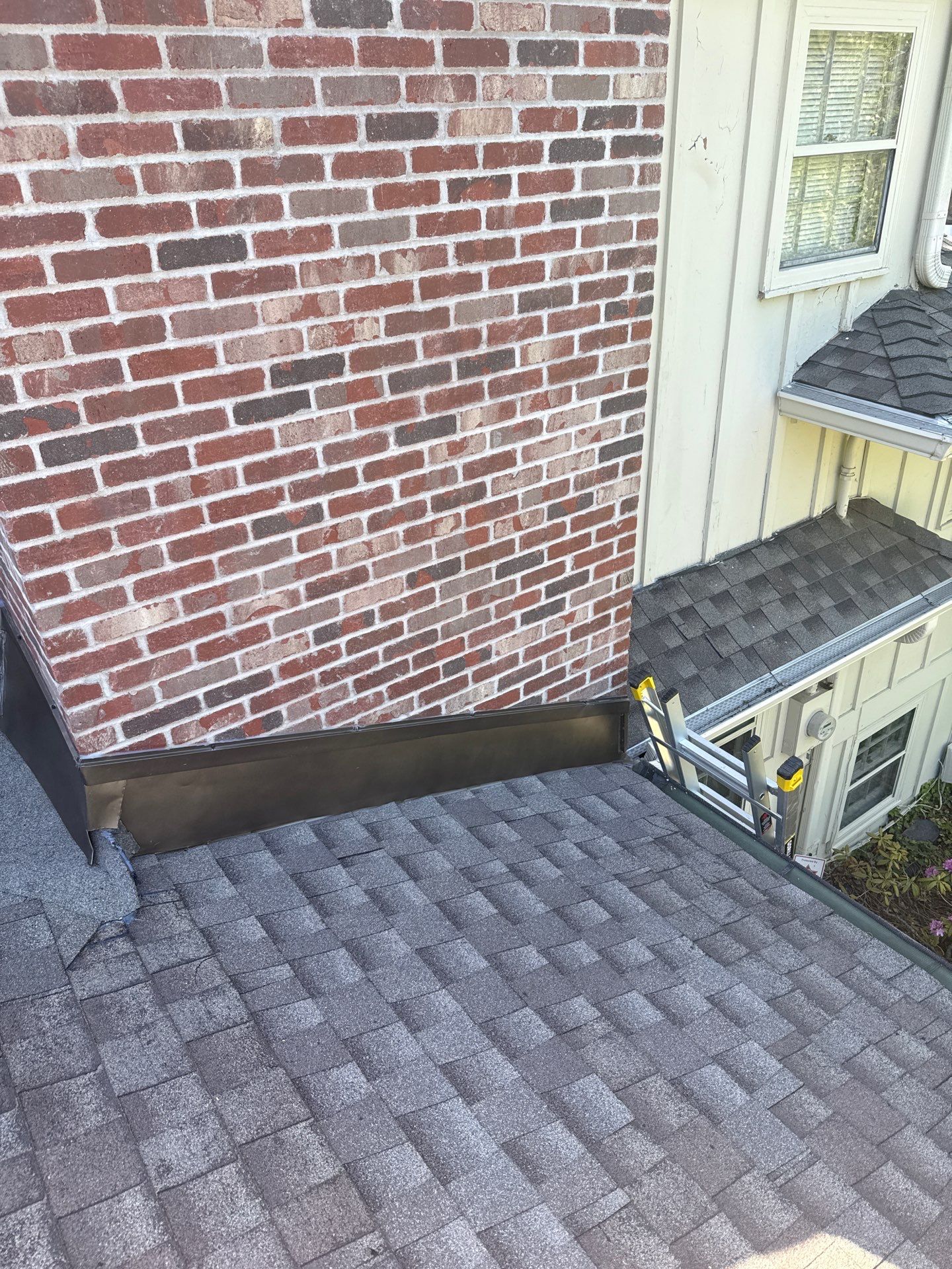 Residential Roof Replacement and Chimney Repair in Leawood by Summit Roofing
