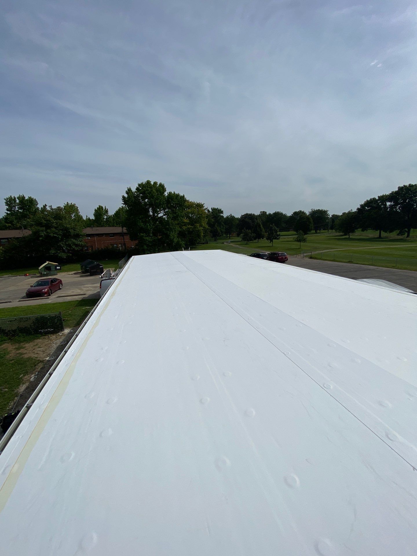 Commercial Flat Roof and Siding by Nitro Roofing and Construction