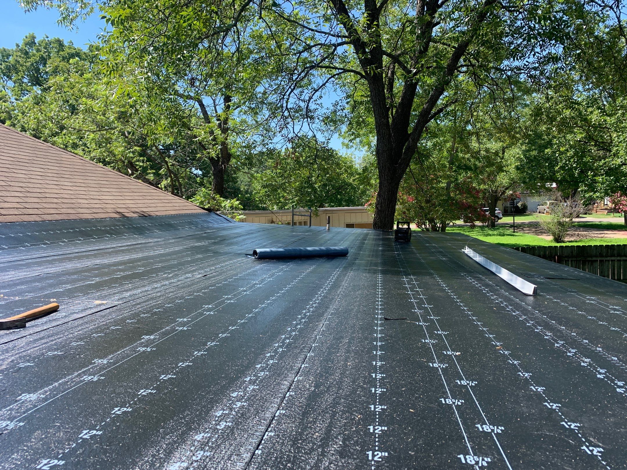 Residential Roofing Installation using Modified Bitumen Roll Roofing by Harvey Roofing & Construction