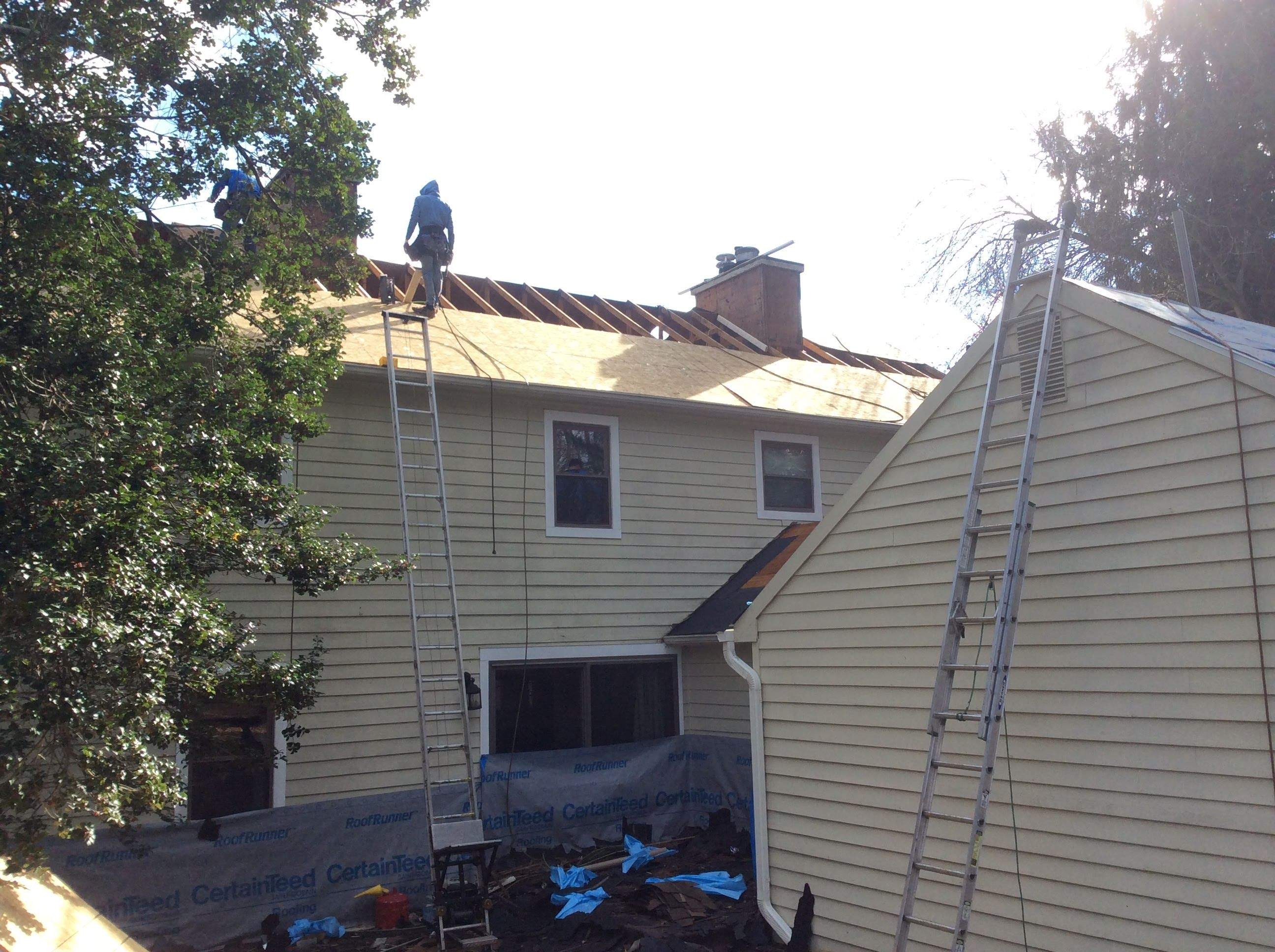 Residential Roofing Installation using Pewterwood Shingles  by Alpha Design Services