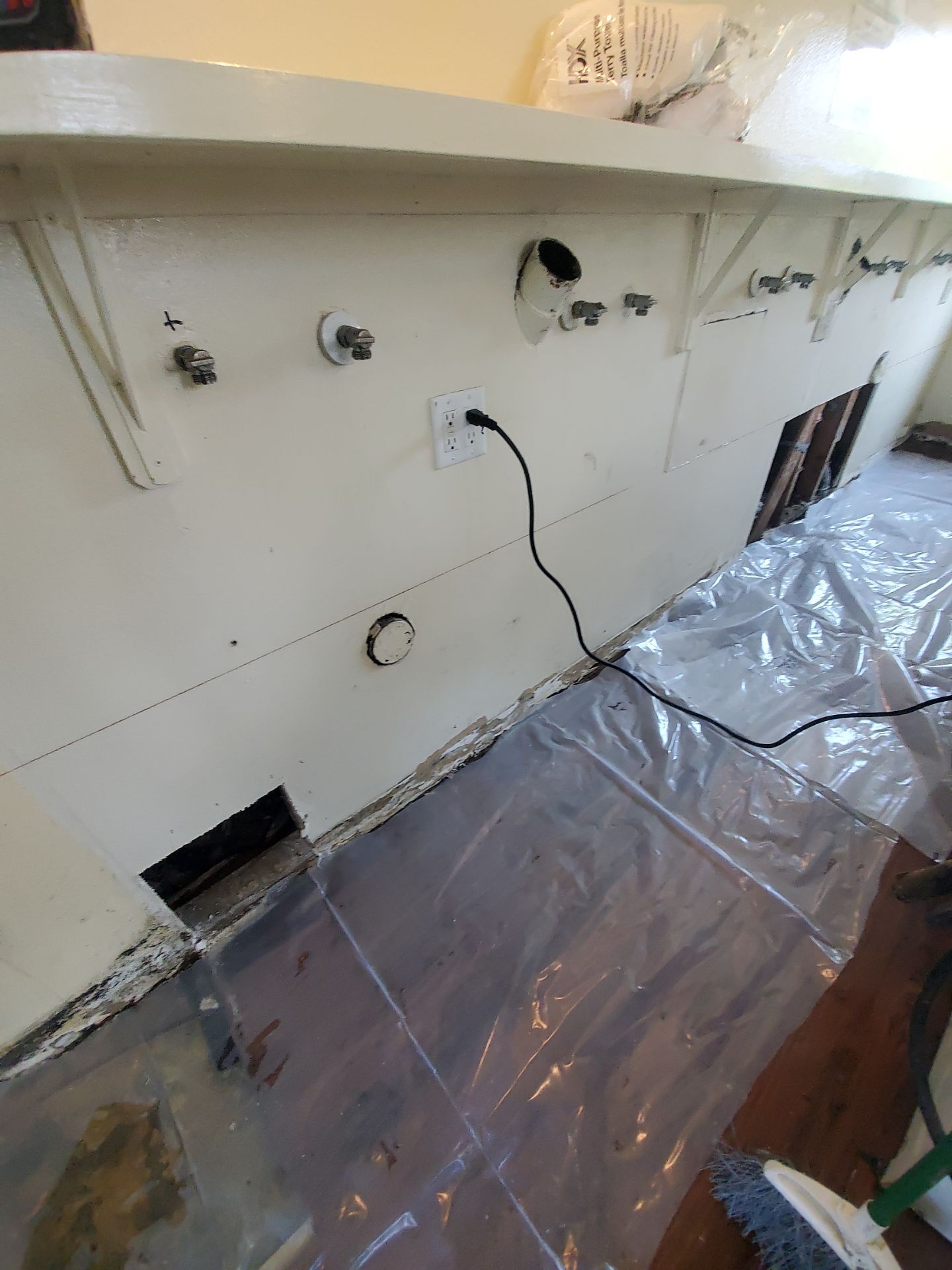 Laundry Room Water Restoration & Rebuild in Irvine by One Stop Source