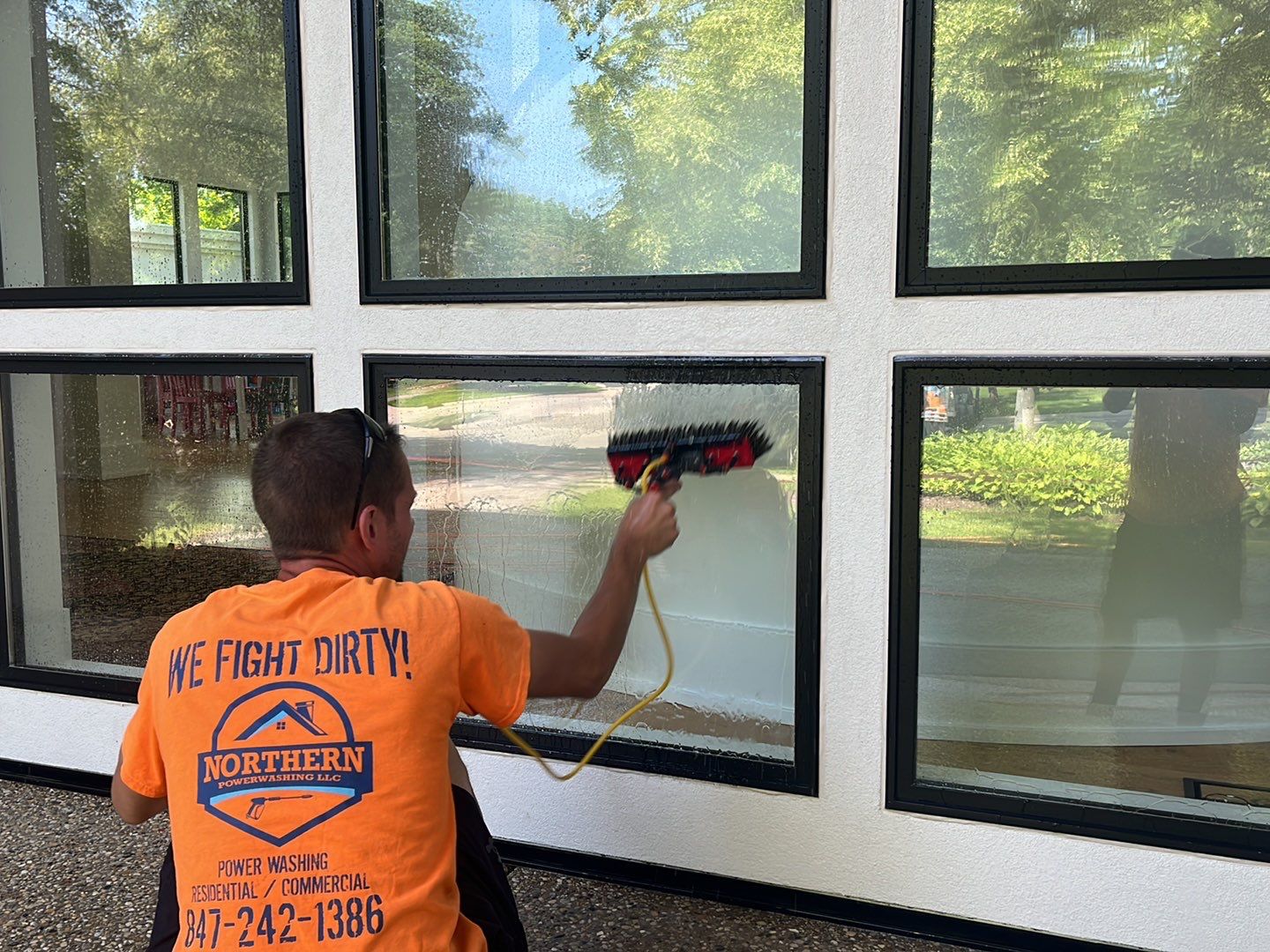 Aggregate concrete cleaning and sealing using Surebond SB-9000 by Northern Power Washing LLC.