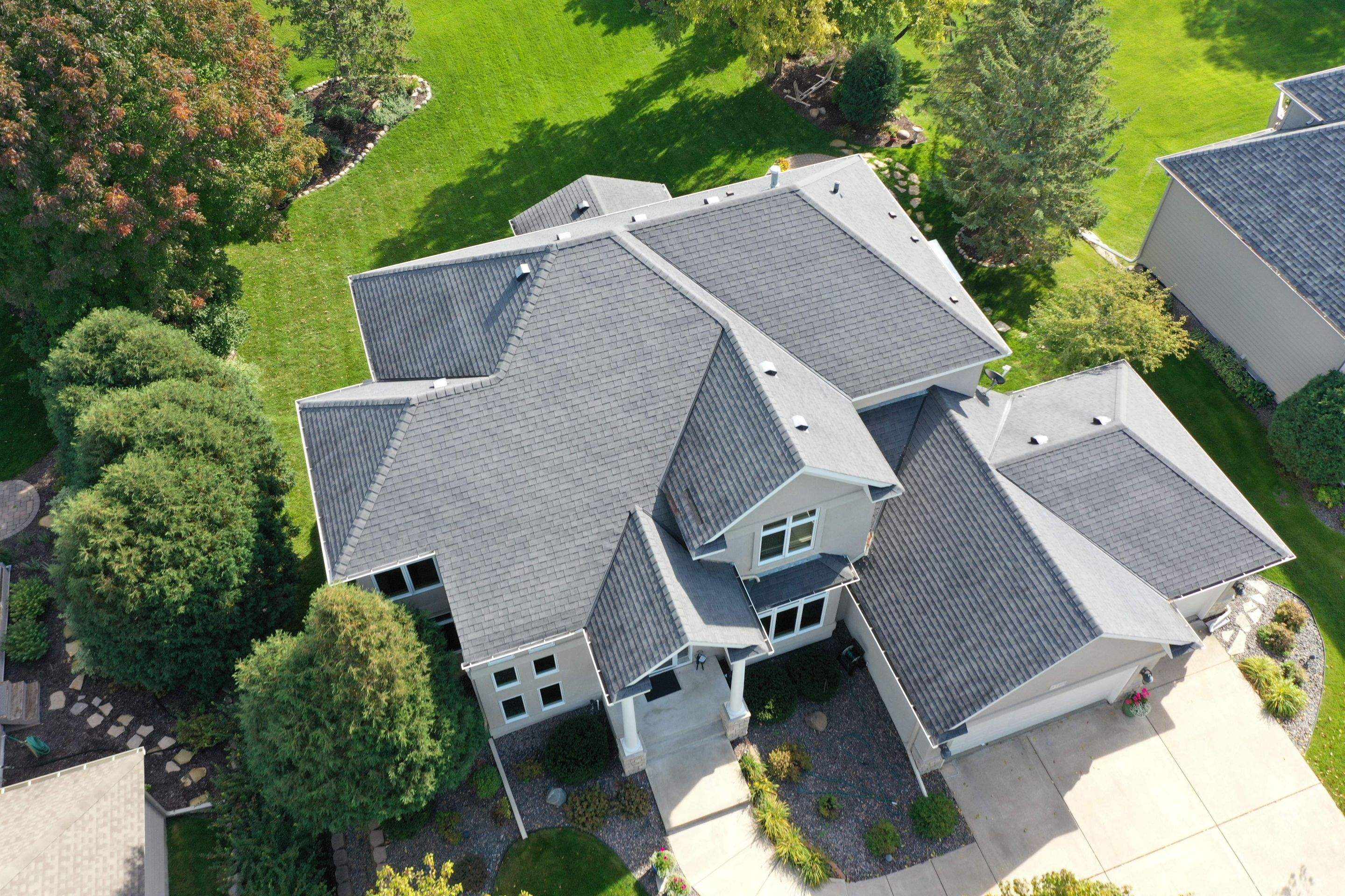 Residential Roofing Installation using Certainteed Landmark Moire Black by MODERN EXTERIOR SYSTEMS