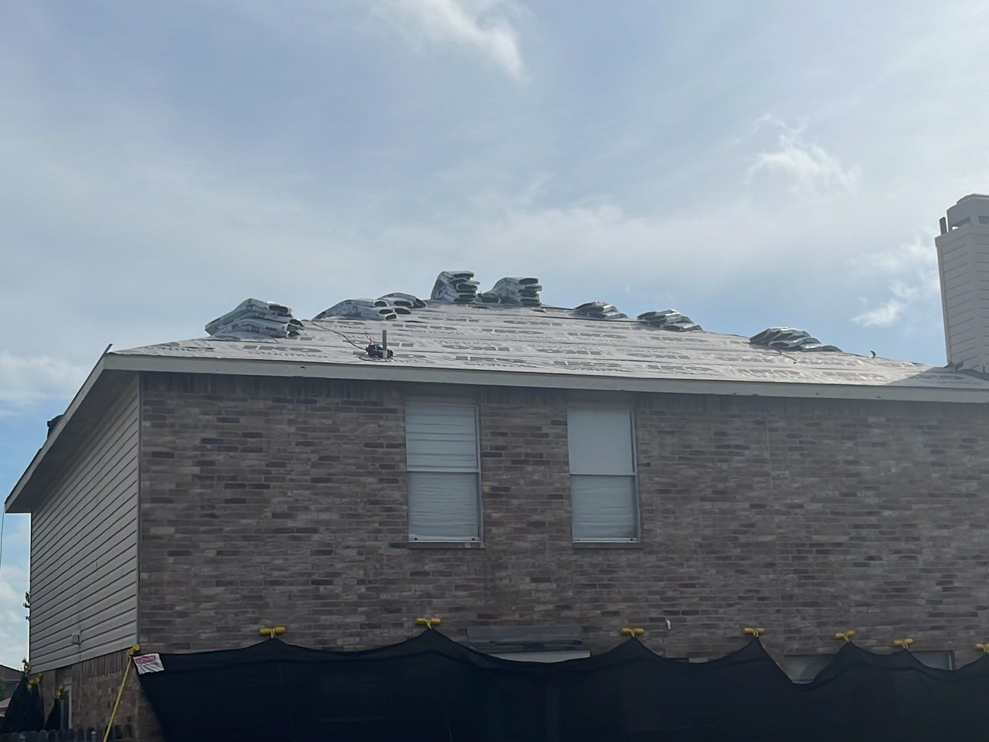 Full Roof Replacement, Chimney Rebuild and Interior Damage Replacement by First United Roofing & Construction