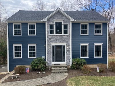 Renewed Siding with Cert. Cedar Board & Batten S-8 Deep Mineral, and Cert. Monogran D/5 x 12'6" clapboard Deep Mineral