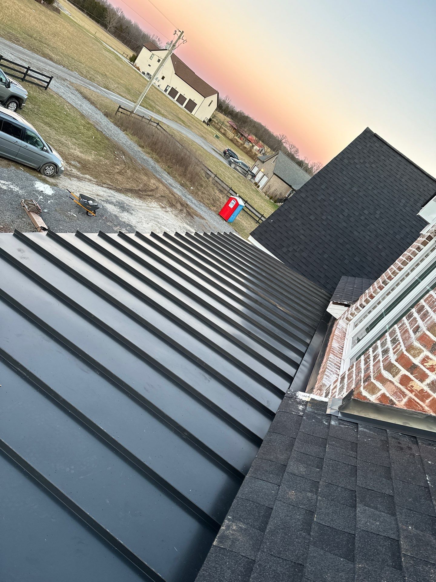 Residential Roofing Installation using Tamko Heritage AR with Standing Seam Metal Porch by Undersun Roofing 