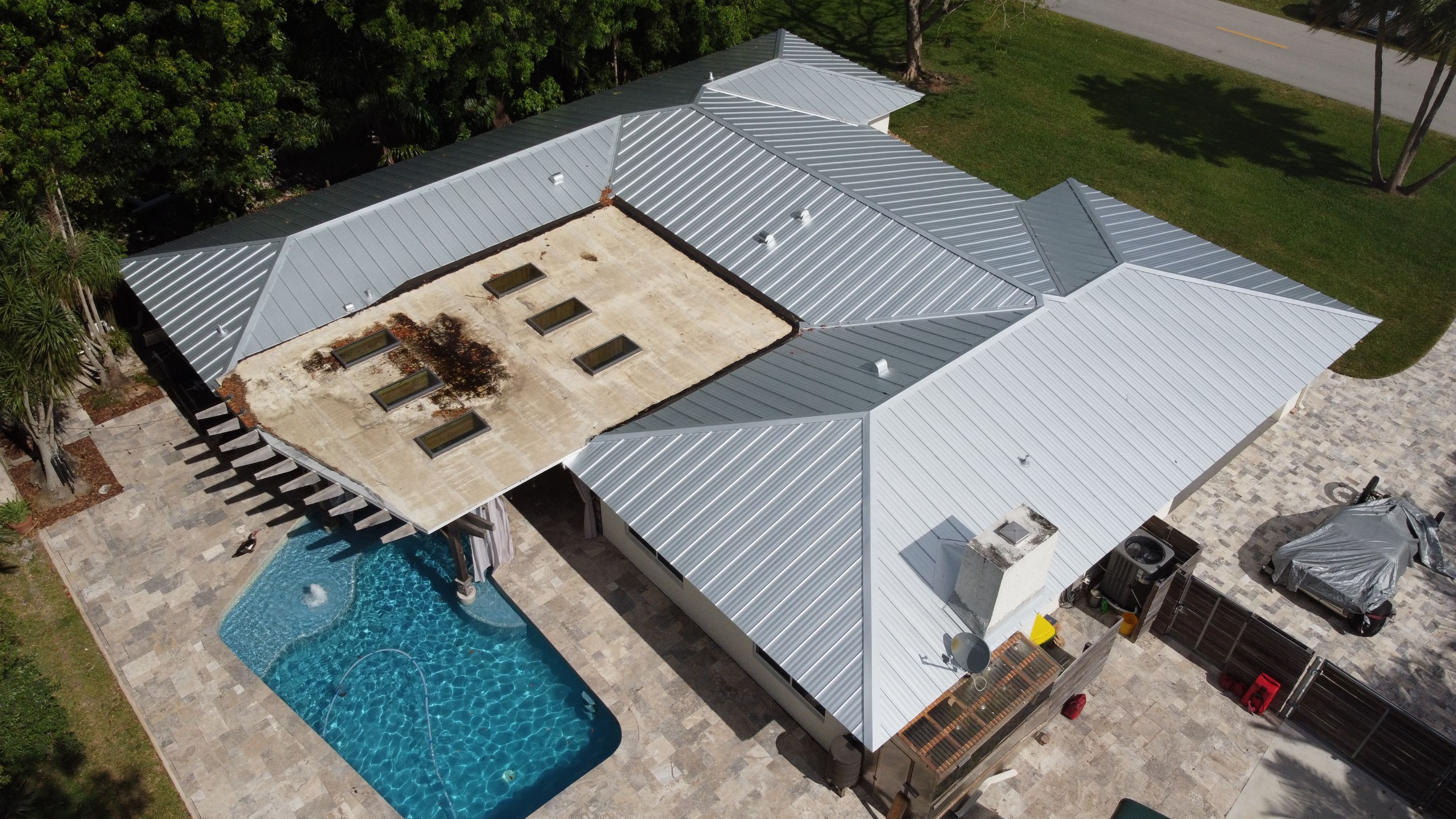 Residential Roofing Installation using 1" Nail strip metal roof by BLUES BROTHERS ROOFING
