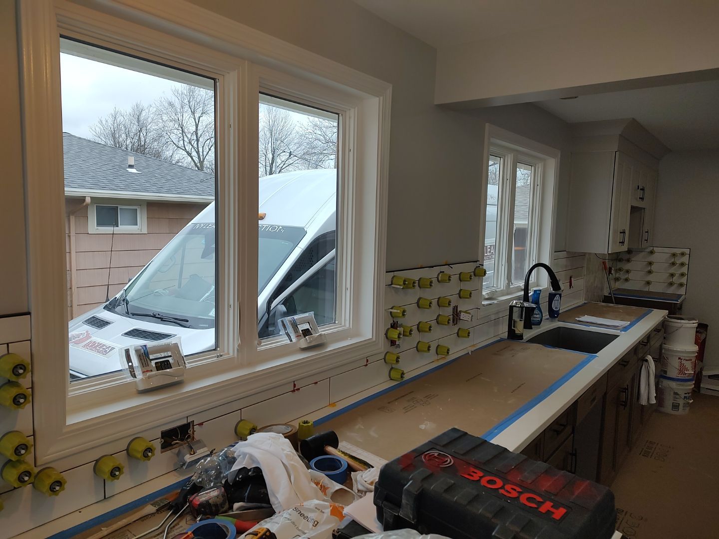 Interior Renovations, Kitchen Remodel, and Window Replacement by Ivy Lea Construction