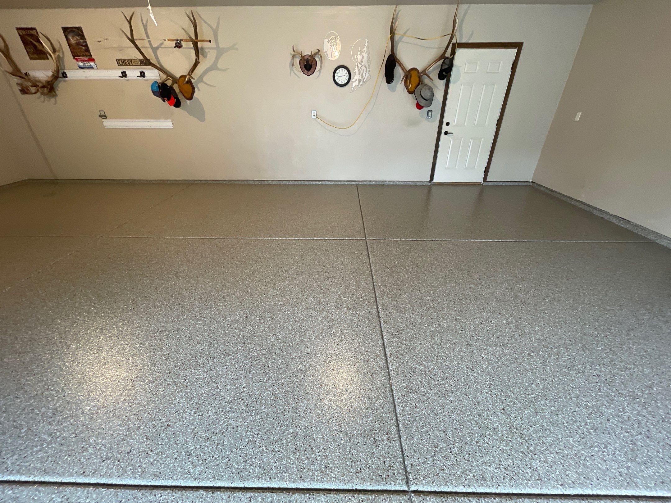 Garage Transformation using Pebble Beach and Front Porch using Greystone by Croc Coatings, LLC