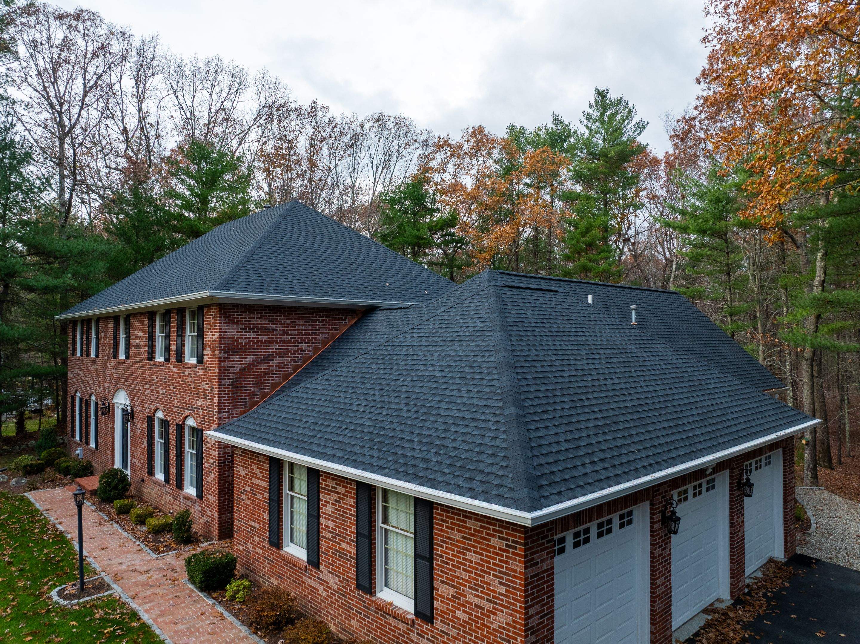 High Hawk - Architectural Shingles, Copper Brick Flashing, Skylights by Rinaldi Brothers