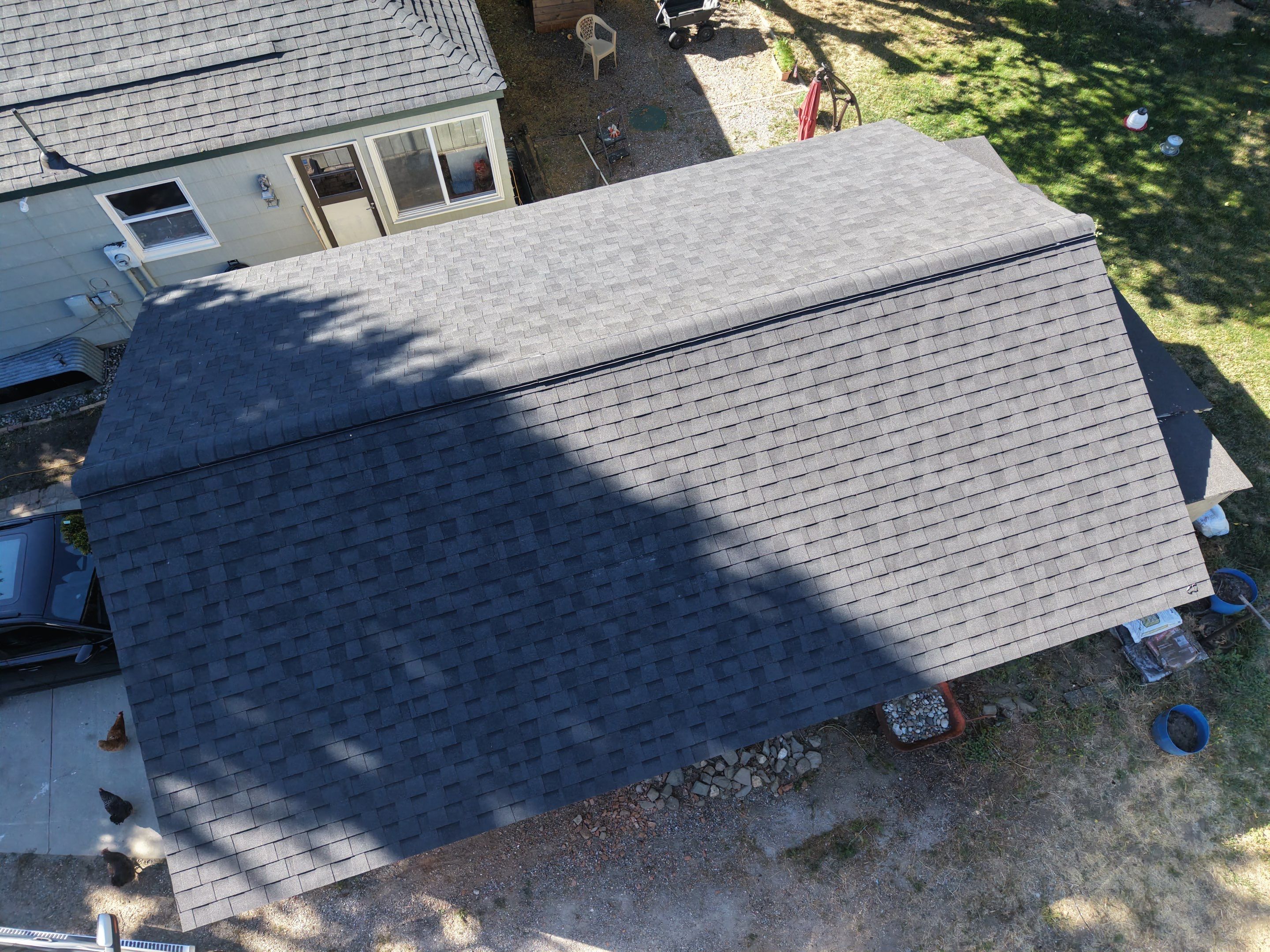 Residential Asphalt Shingle Roof Replacement for Home and Garage in Wenatchee by Alpine Roofing