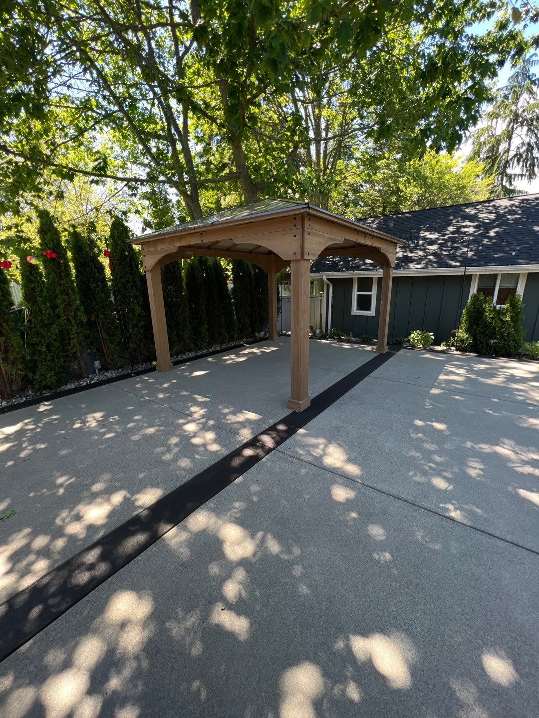 Patio Installation using Concrete, Retaining walls, and Turf install by Jireh Asphalt & Concrete Inc 