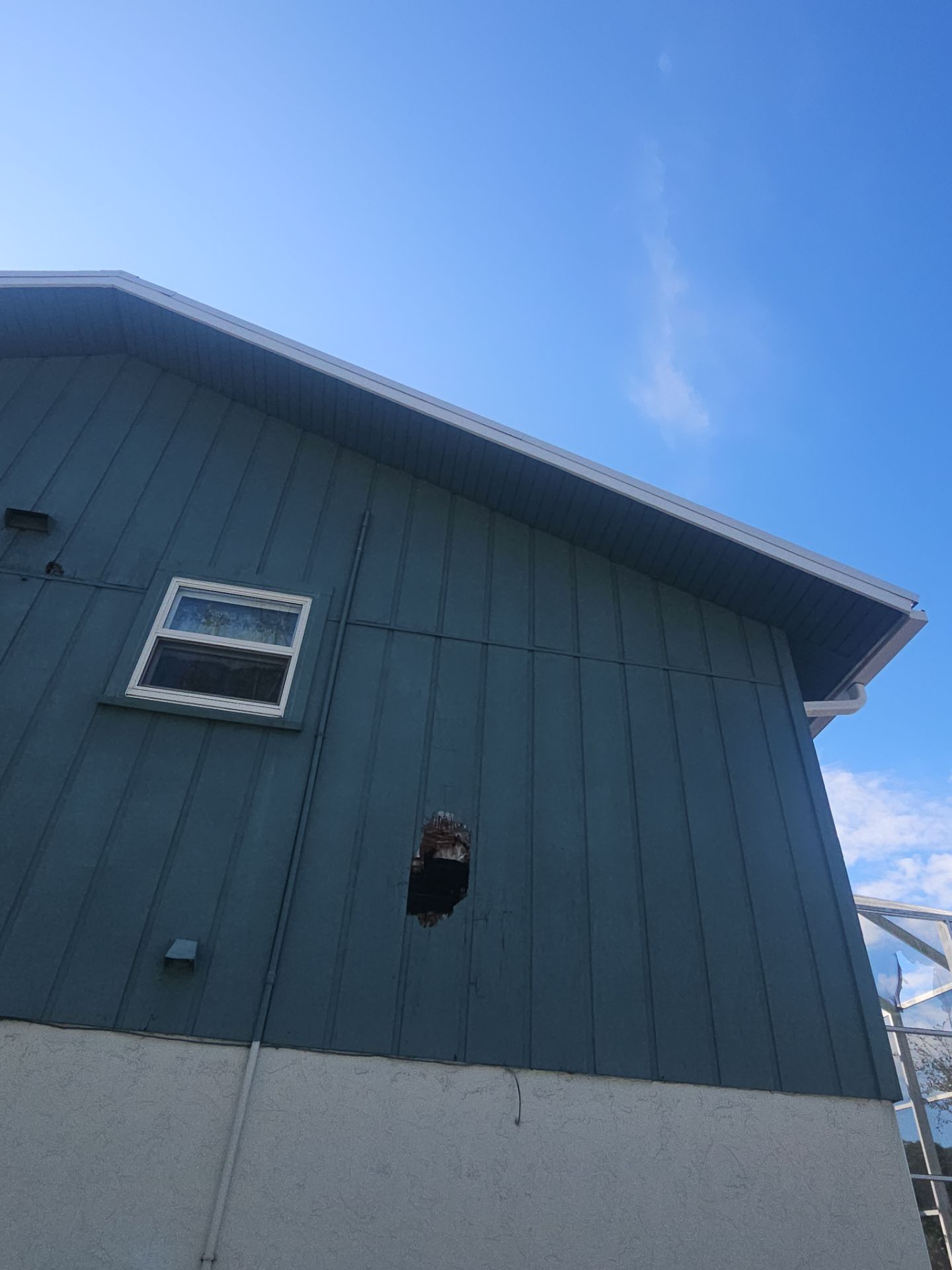 K-Style Seamless Gutter Installation using White Seamless Gutters in Sarasota FL by Gutter Professors