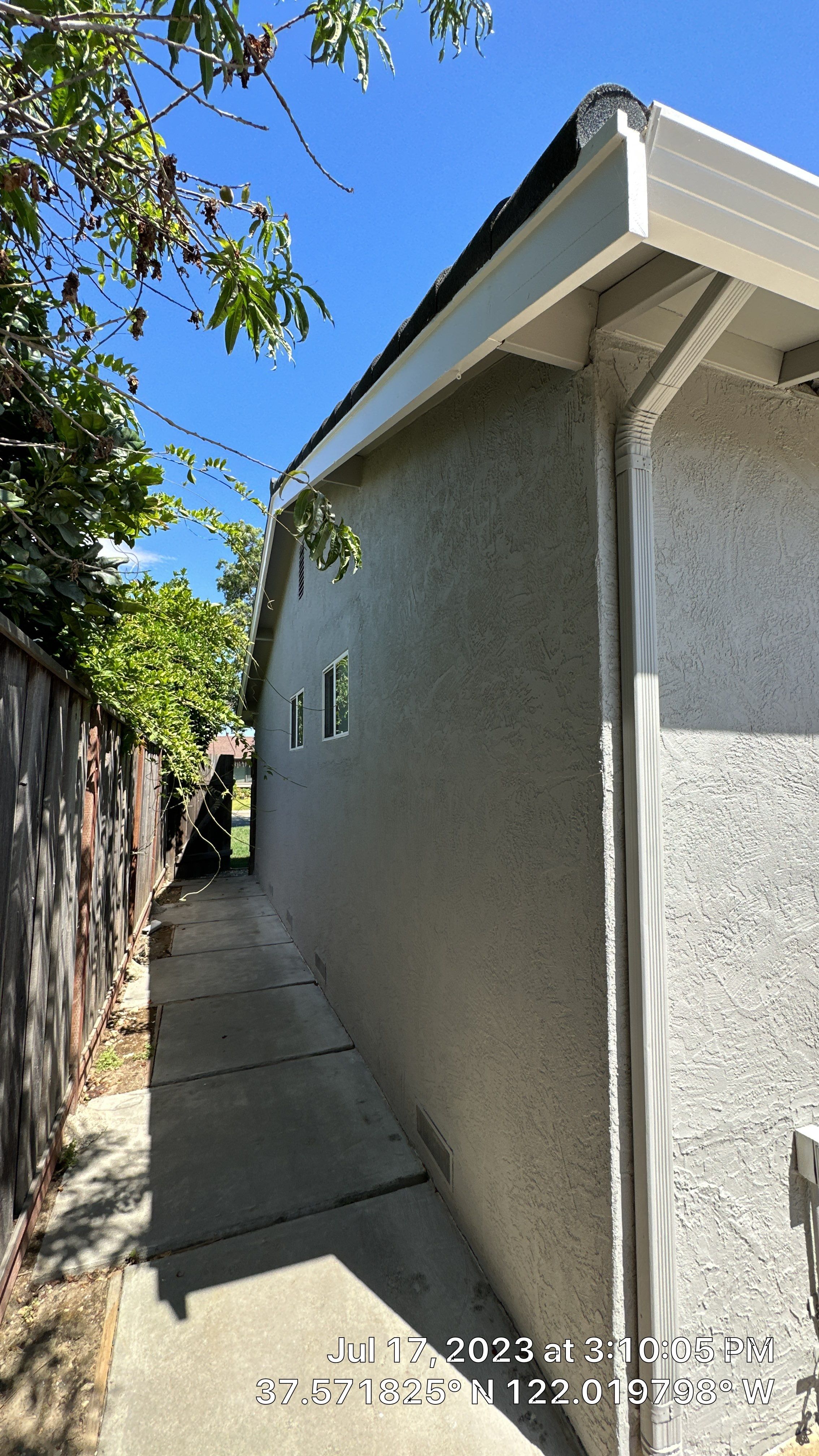 The classy gray house  by Herrera’s Bay Area Painting inc.