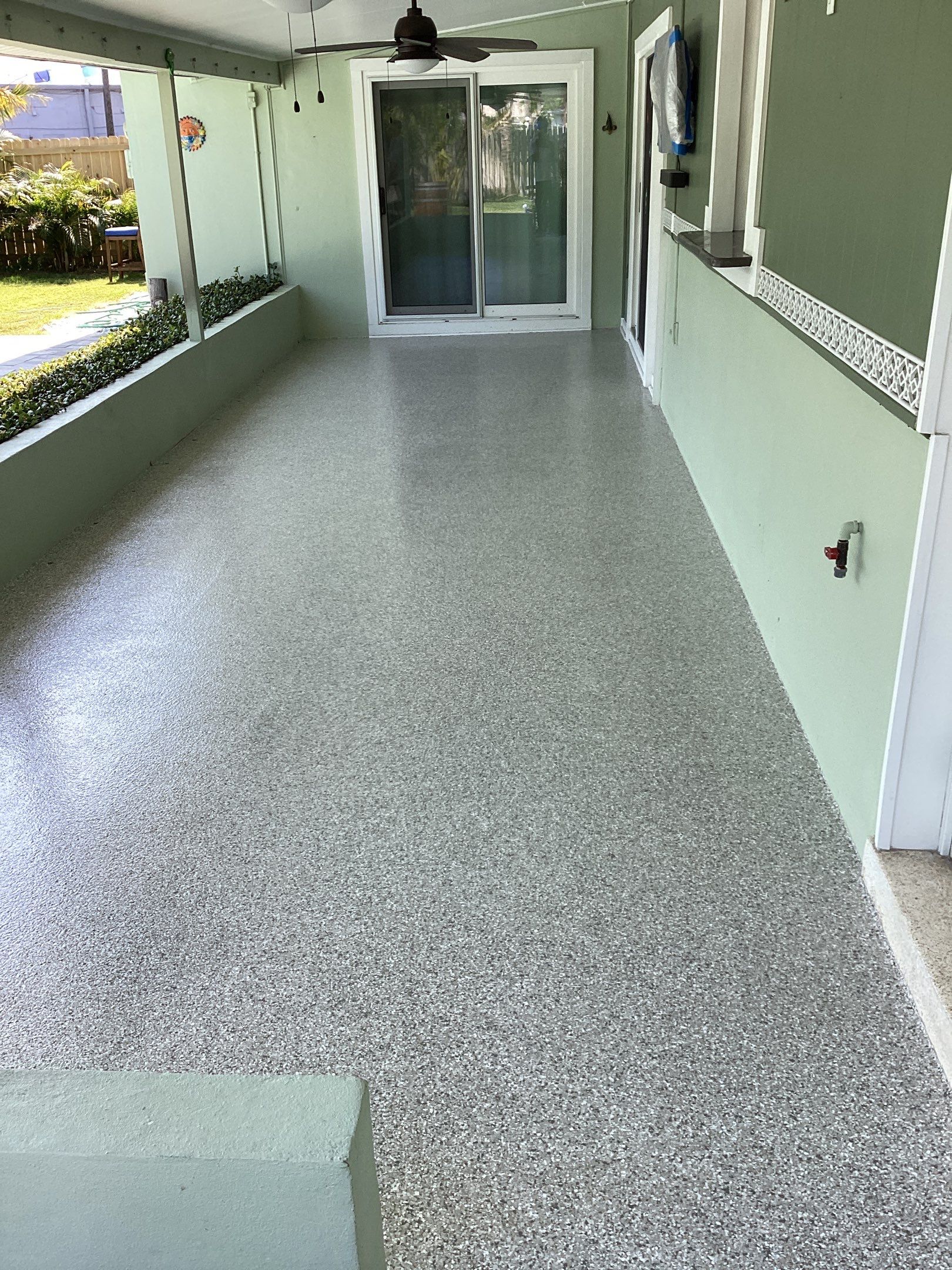 Patio using Mt Everest by Amvet concrete coatings llc