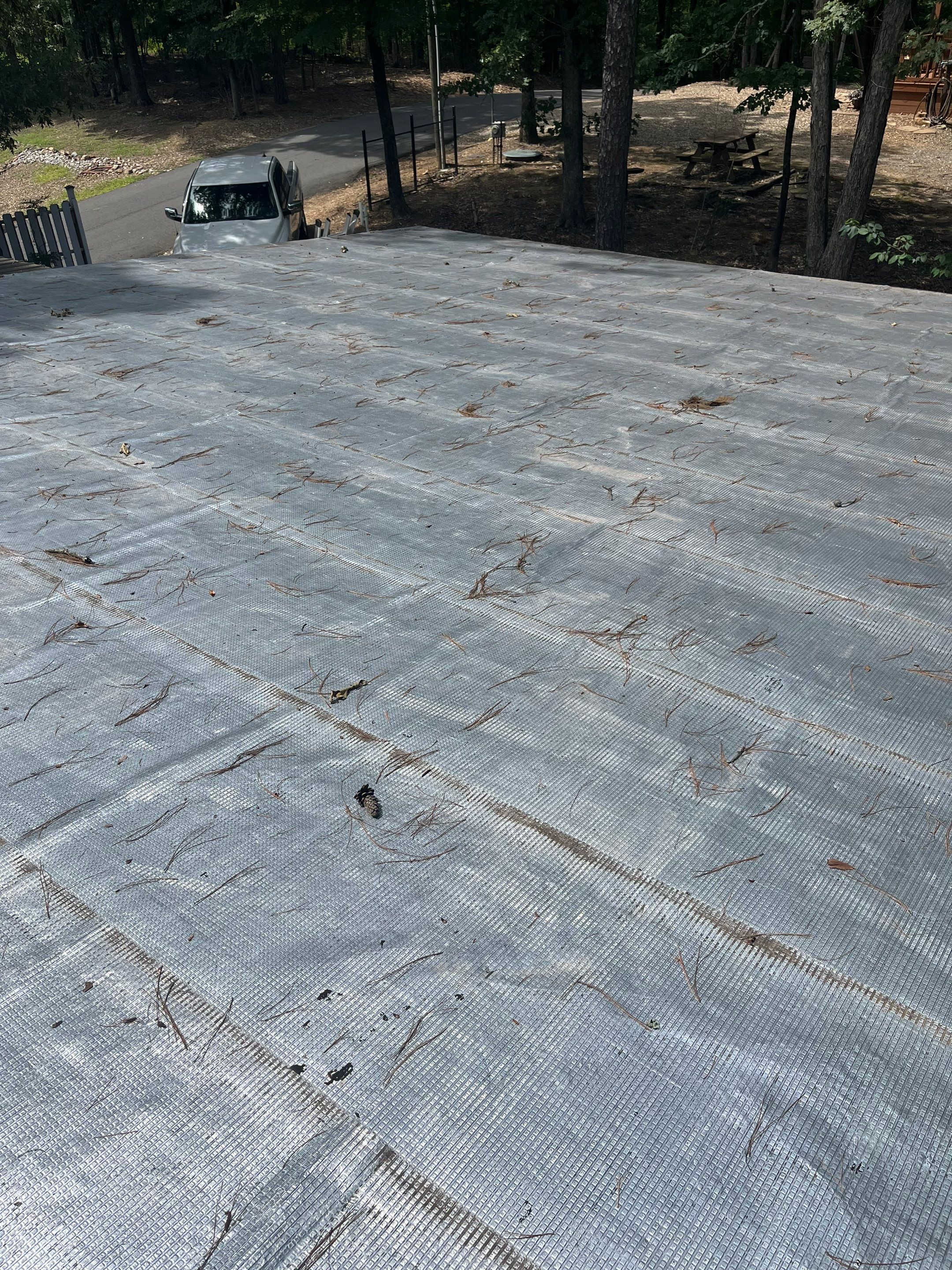 Standing Seam Metal Roof and Gutter Installation in Hot Springs by Temple Roofing and Exteriors