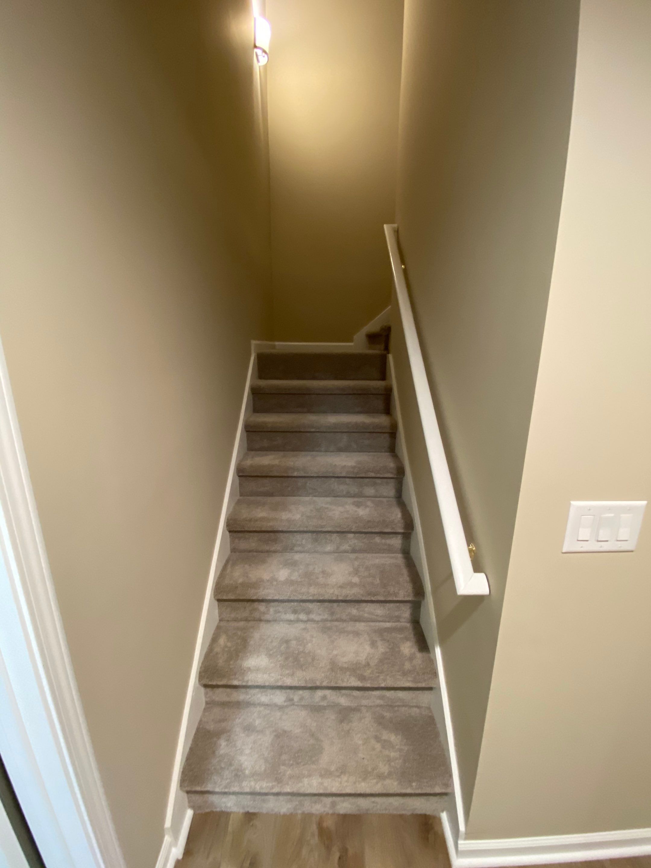 Acworth Basement Transformation With Wet Bar and Stone Fireplace by Swift Home Renovations