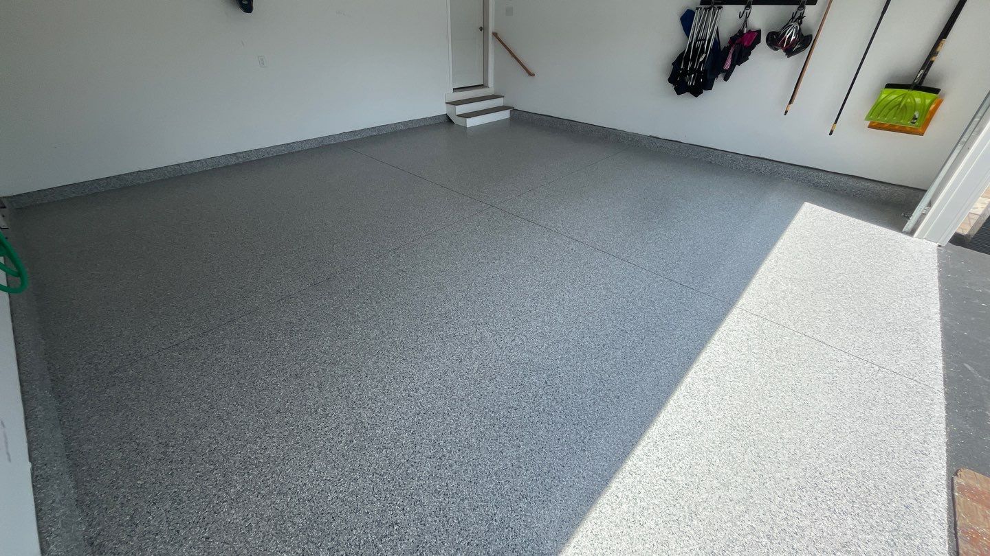 Garage in Londonderry, NH 03053 by Symphony Concrete Coatings