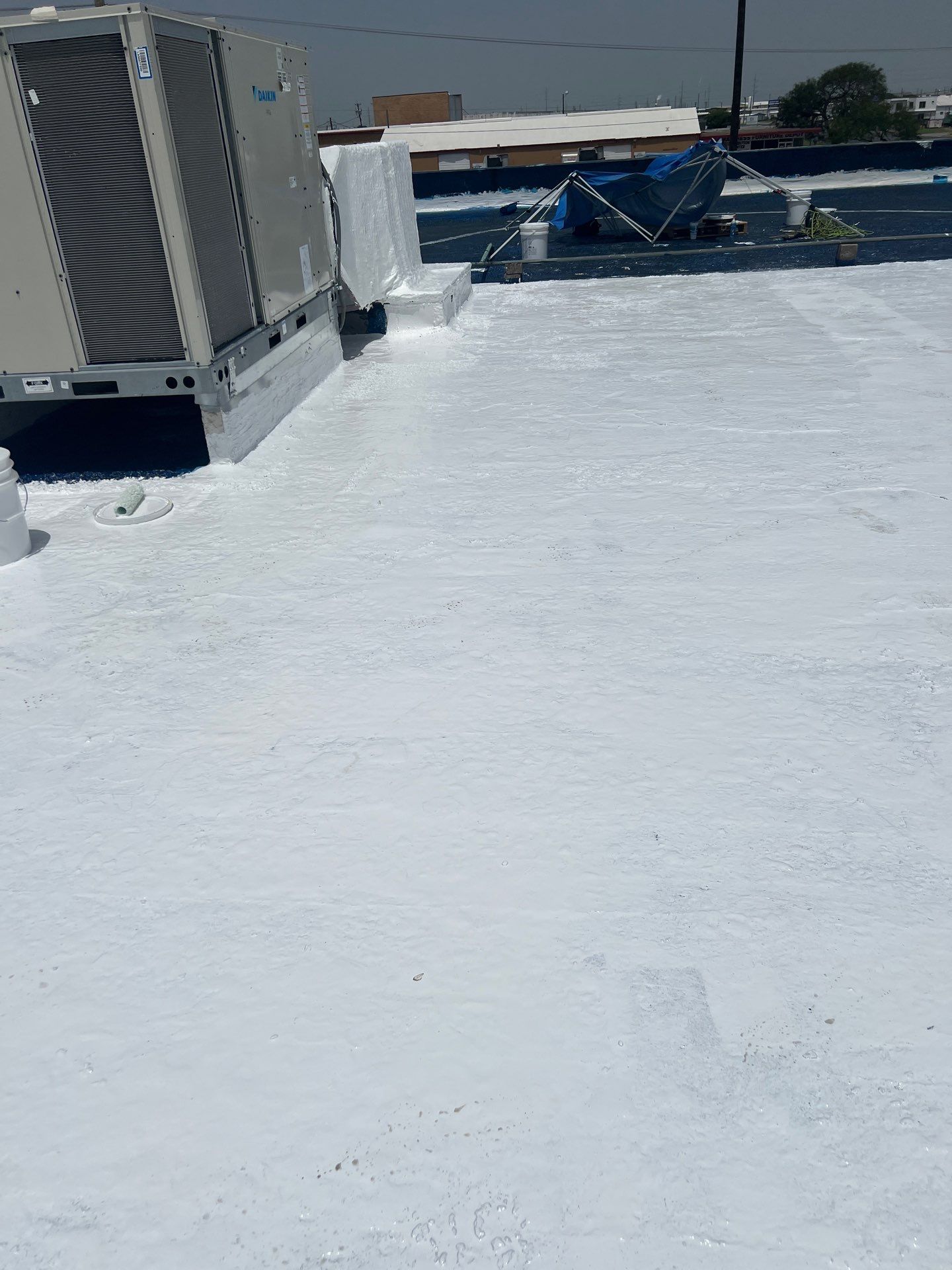 Dirty leaking Gravel Roof by Bayfront Roofing and Construction