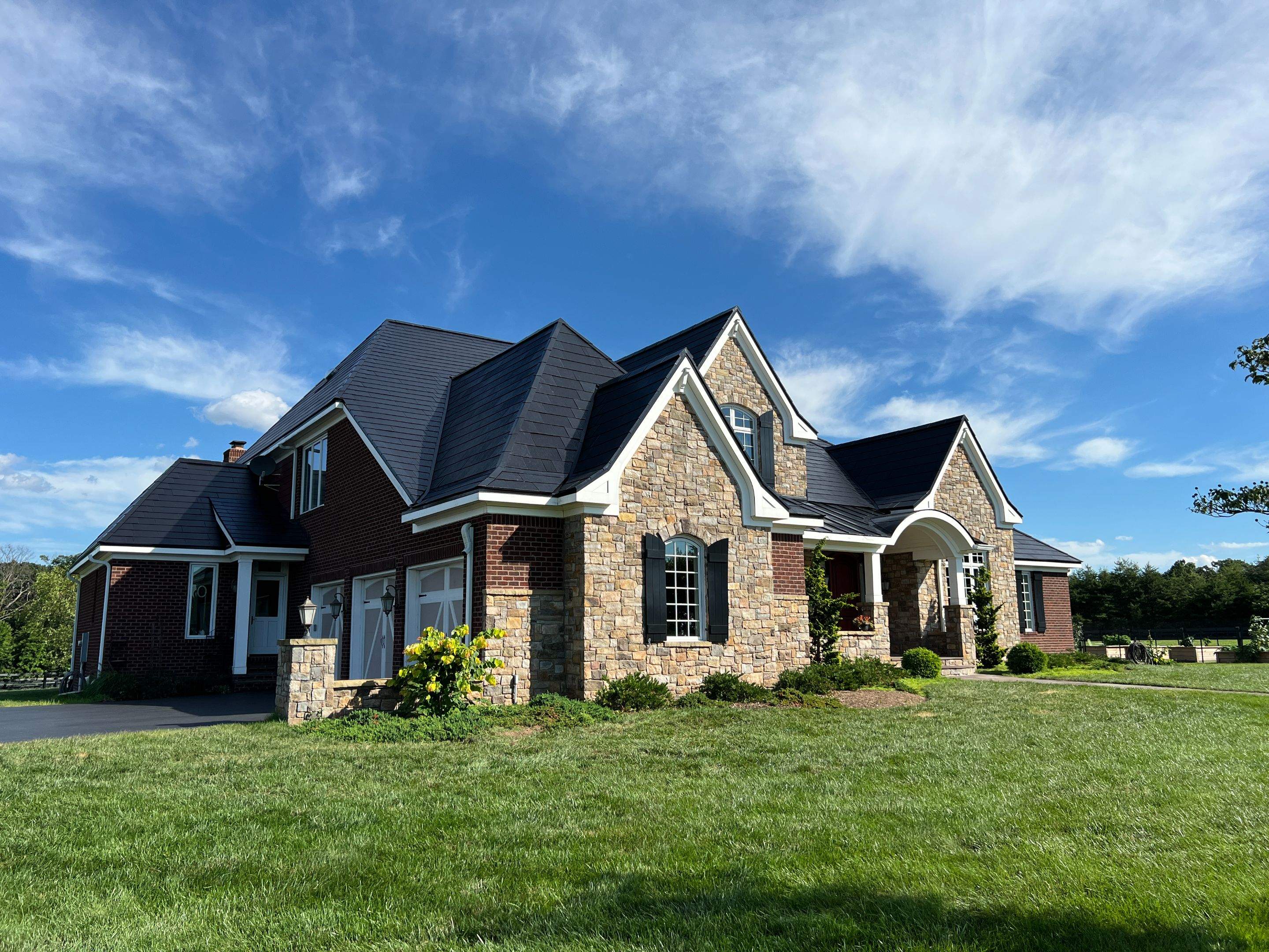 Tesla Solar Roof Manassas, VA by American Home Contractors