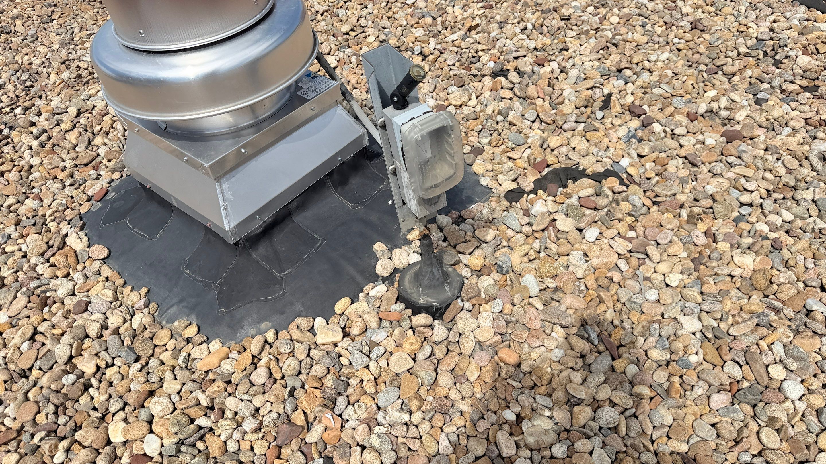 EPDM Commercial Roof Repair and Ballast Maintenance in Centennial by Rhino Roofing LLC