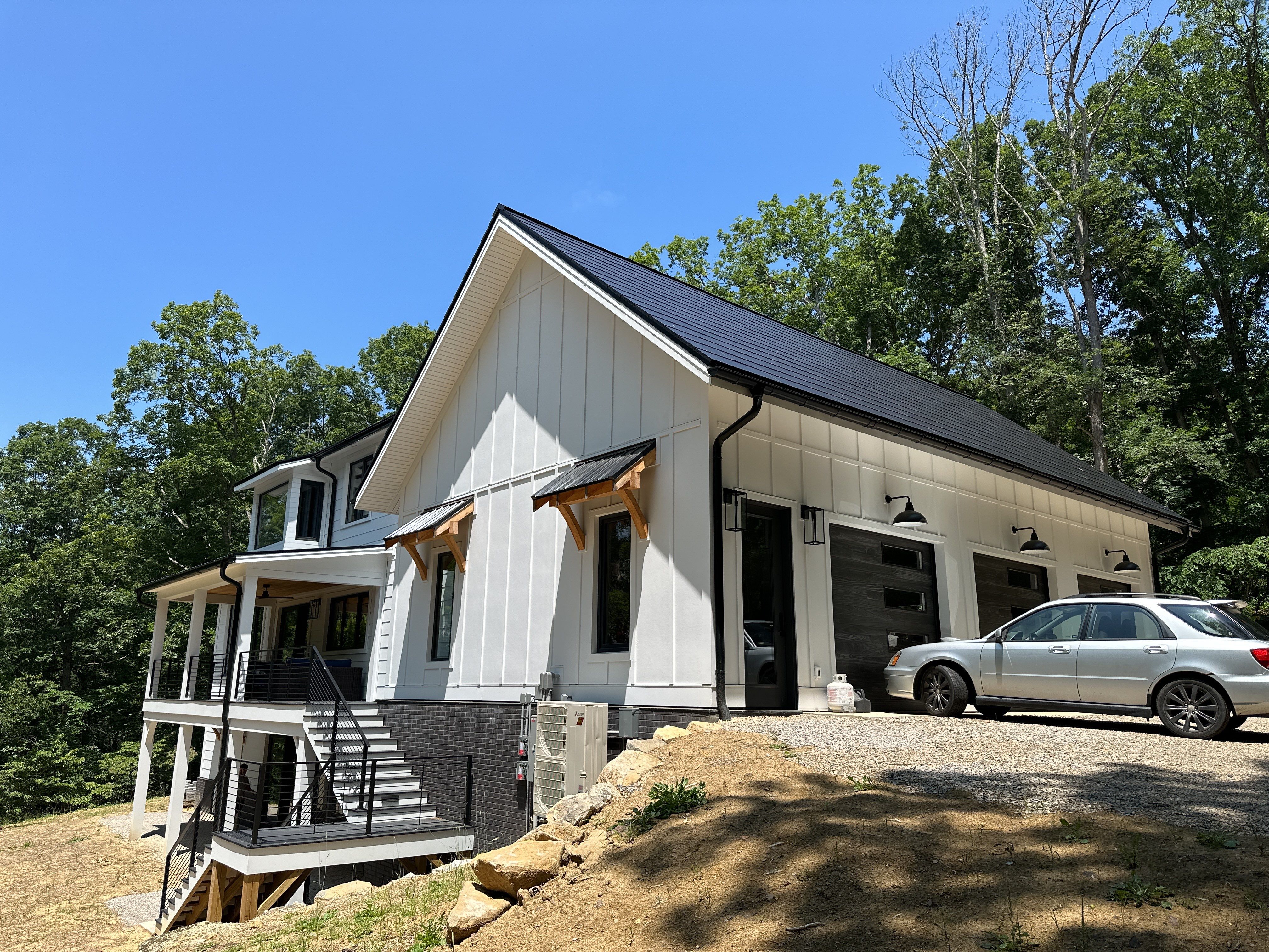 New Construction with Tesla Solar Roof + Powerwall by American Home Contractors
