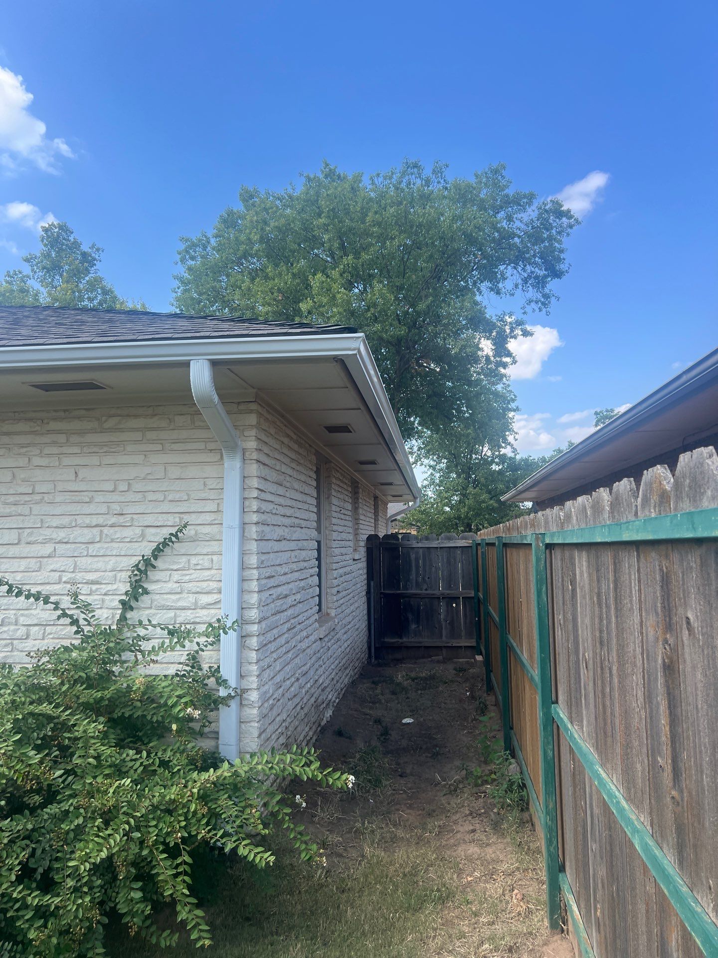 Roof Replacement and Gutter Installment in Enid, OK by McCann's Roofing and Construction