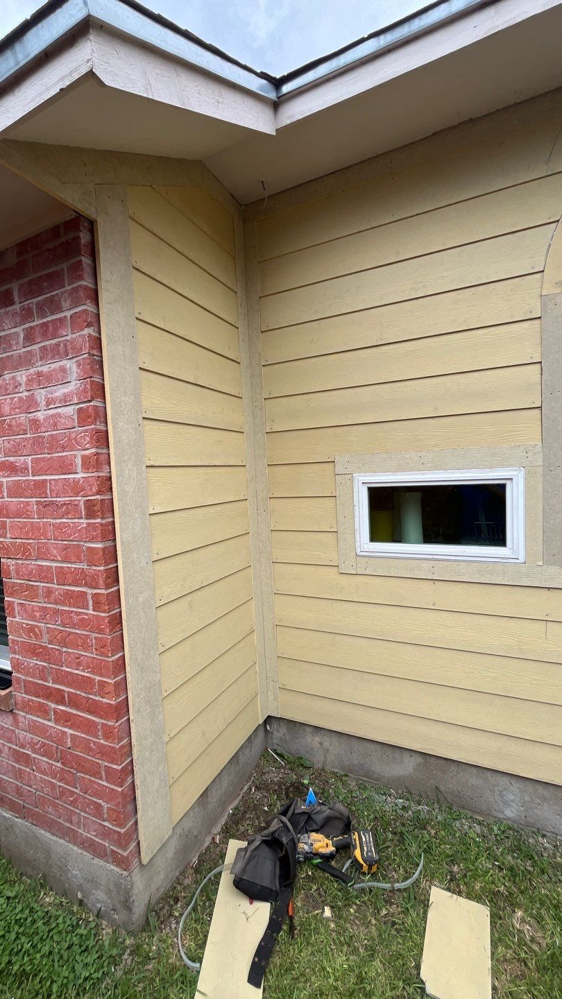 Windows with a side of Siding  by Bayfront Roofing and Construction