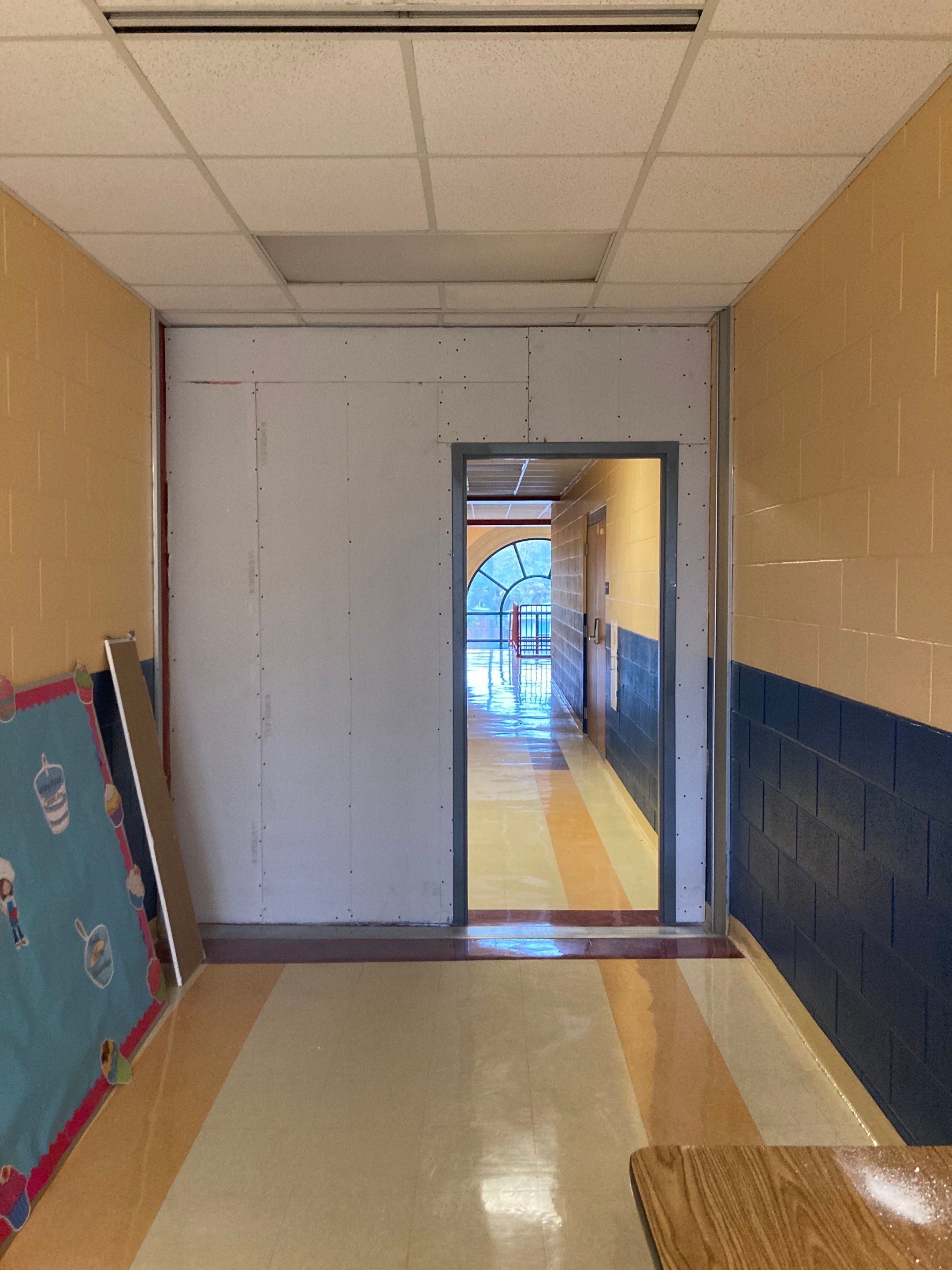 Wall Repair and Door Installation by Dodson House Moving