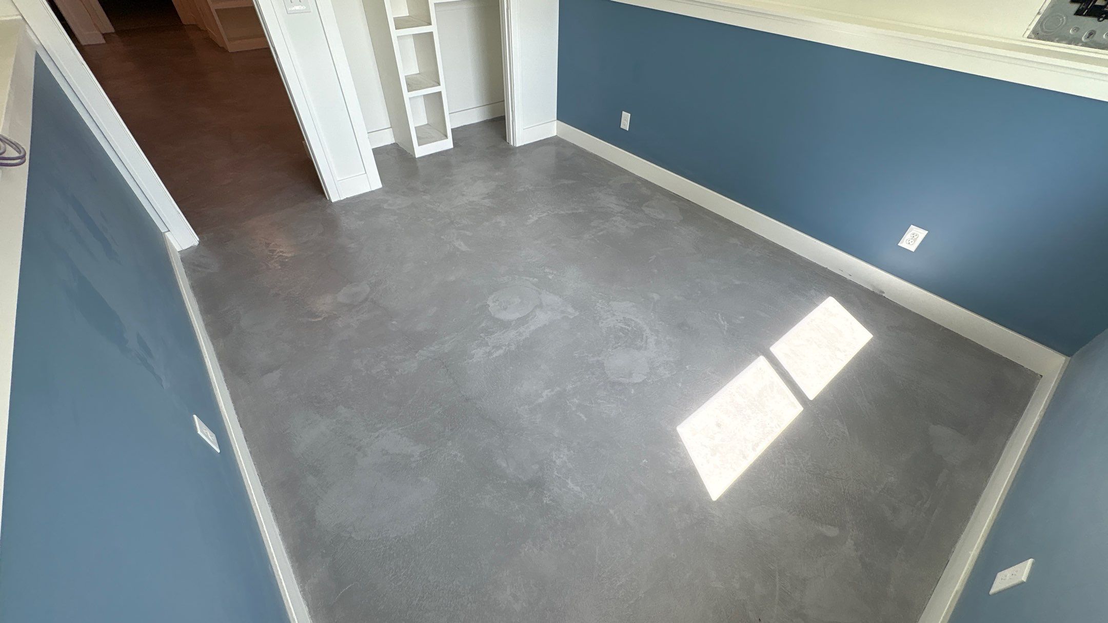 Basement Floor Overlay - Lawrence, KS by Big Red Decorative Concrete, LLC