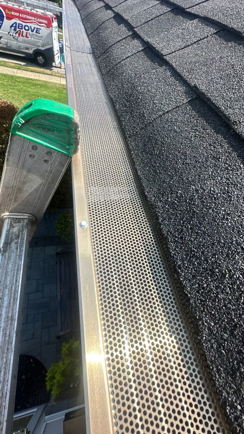Cleaning and Microguard Installation. by Above All Gutters 