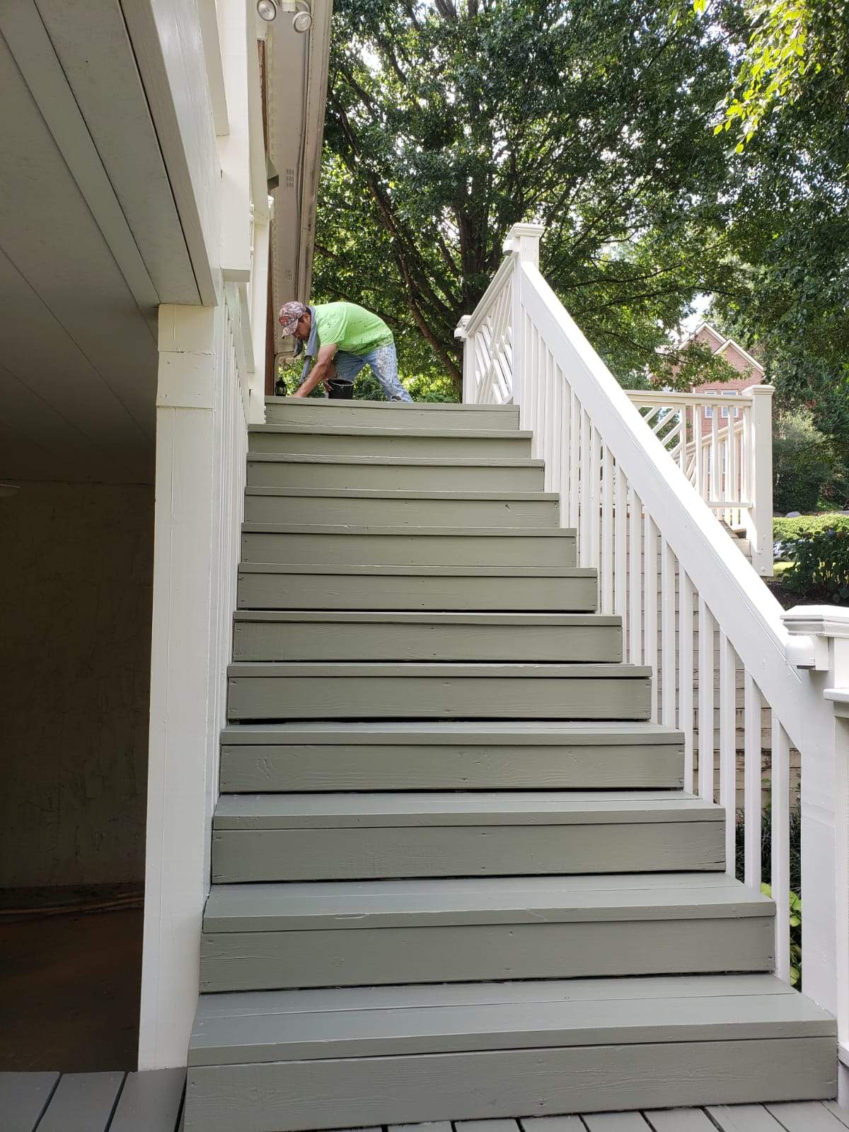Roswell Deck Restoration Featuring Pressure-Treated Wood and Grey Finish by Swift Home Renovations 