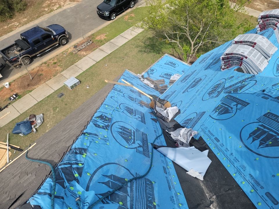Residential Roofing Installation using Roof Replacement by American Roofing & Construction LLC