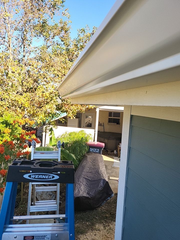 Gutter Installation using K-Style White Seamless Gutters by Gutter Professors