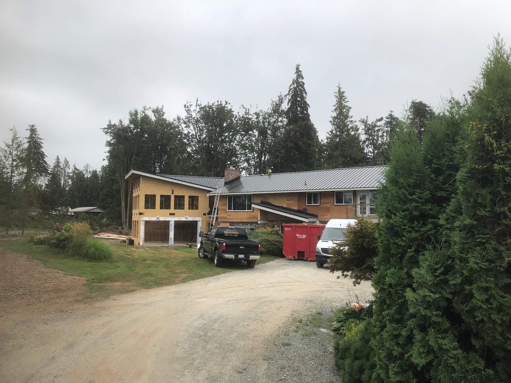 Residential Roofing Installation using 12" Prolok metal  by Top Notch Roofing Inc