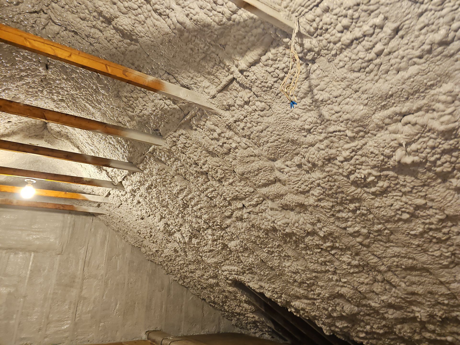 Attic Retrofit using open cell spray foam by NYS Foam & Energy
