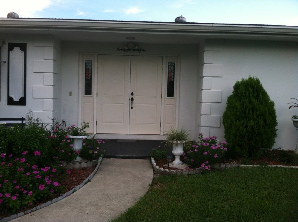 Double Entry Door Installation with Impact Glass Sidelights in Plantation by The Door Doctor of South Florida, Inc.