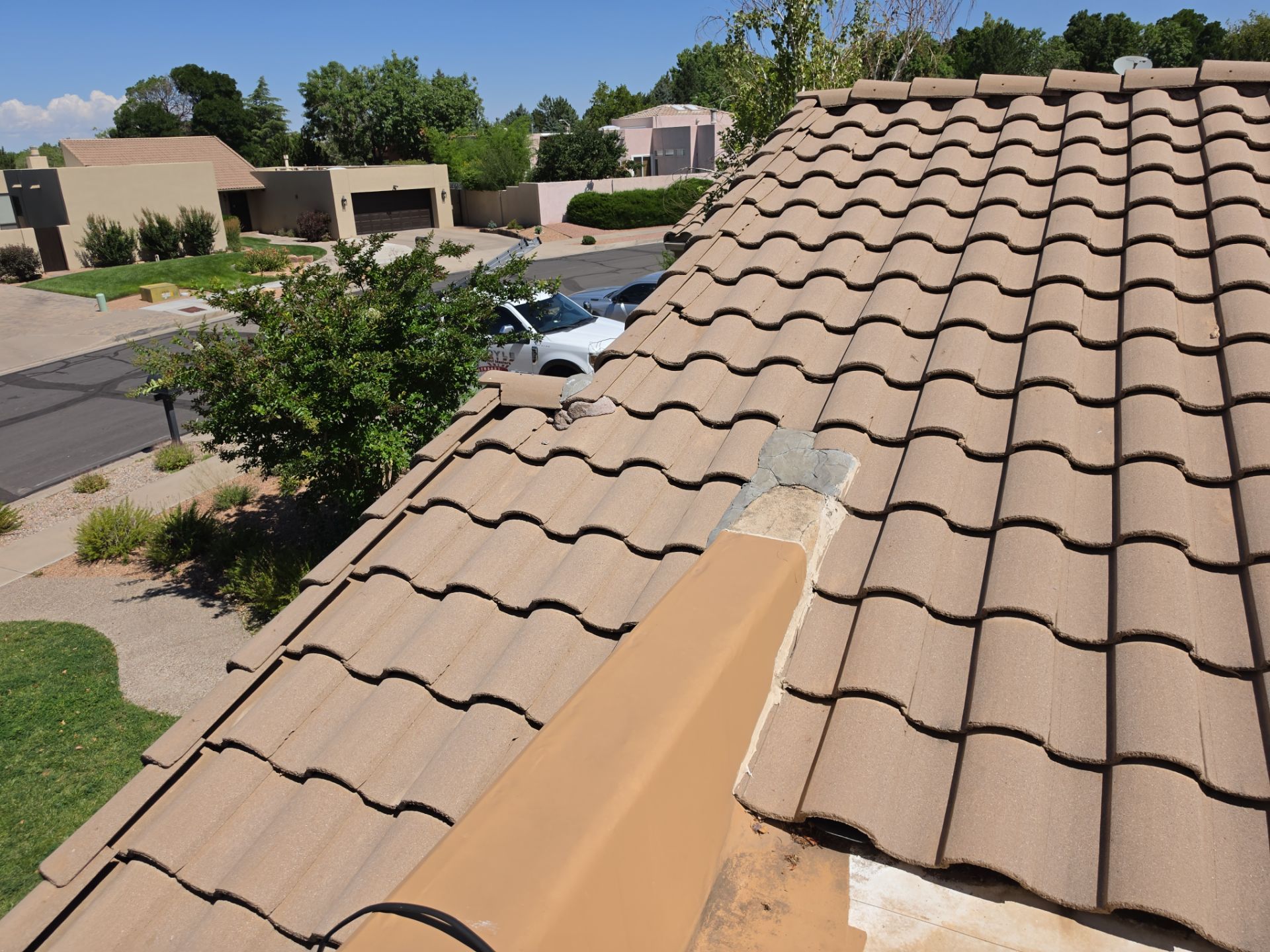 Tile and TPO Roof Maintenance and Gutter Cleaning in Sandia Heights by Doyle Roof Masters Inc
