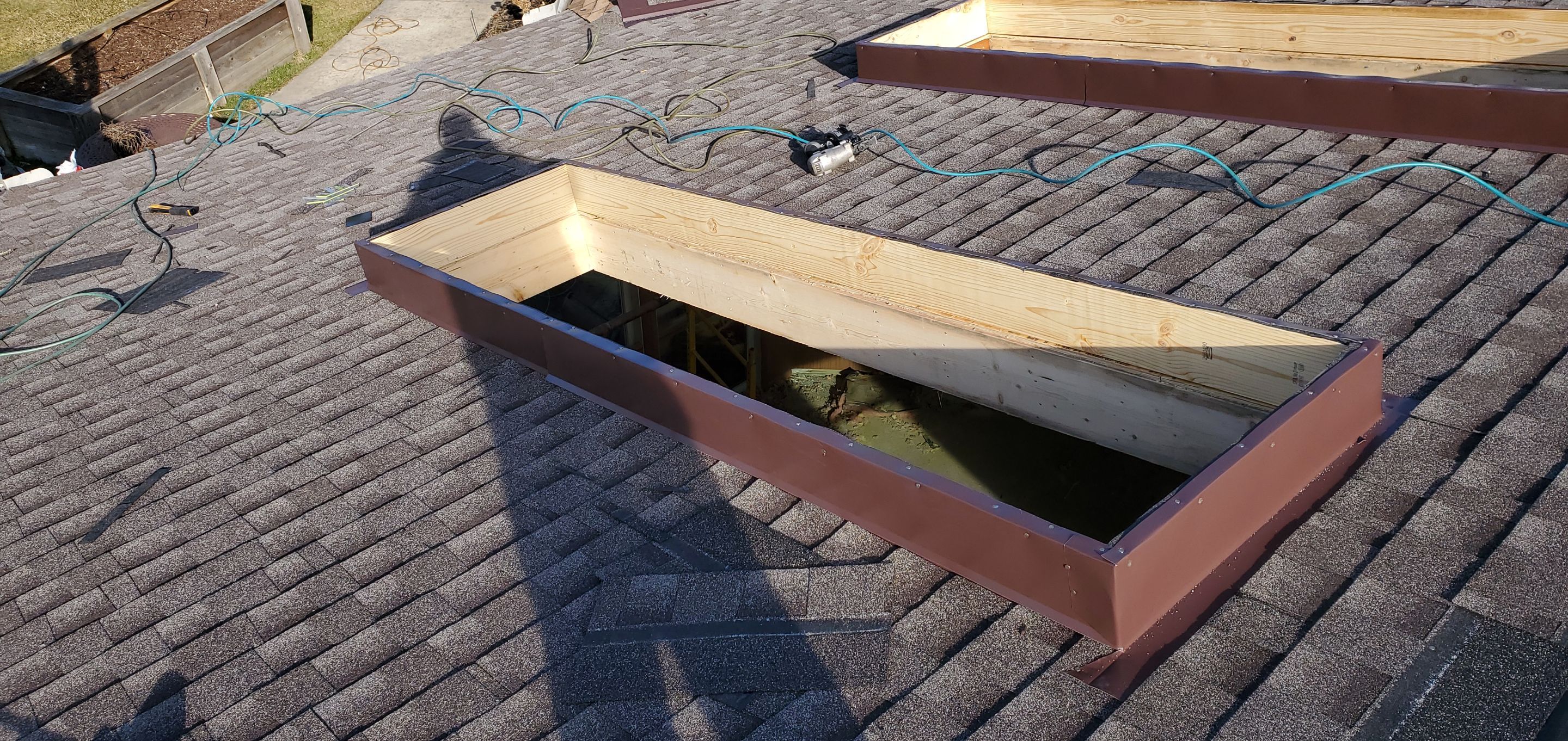 Skylight removal and install  by Absolute Roofing and Construction