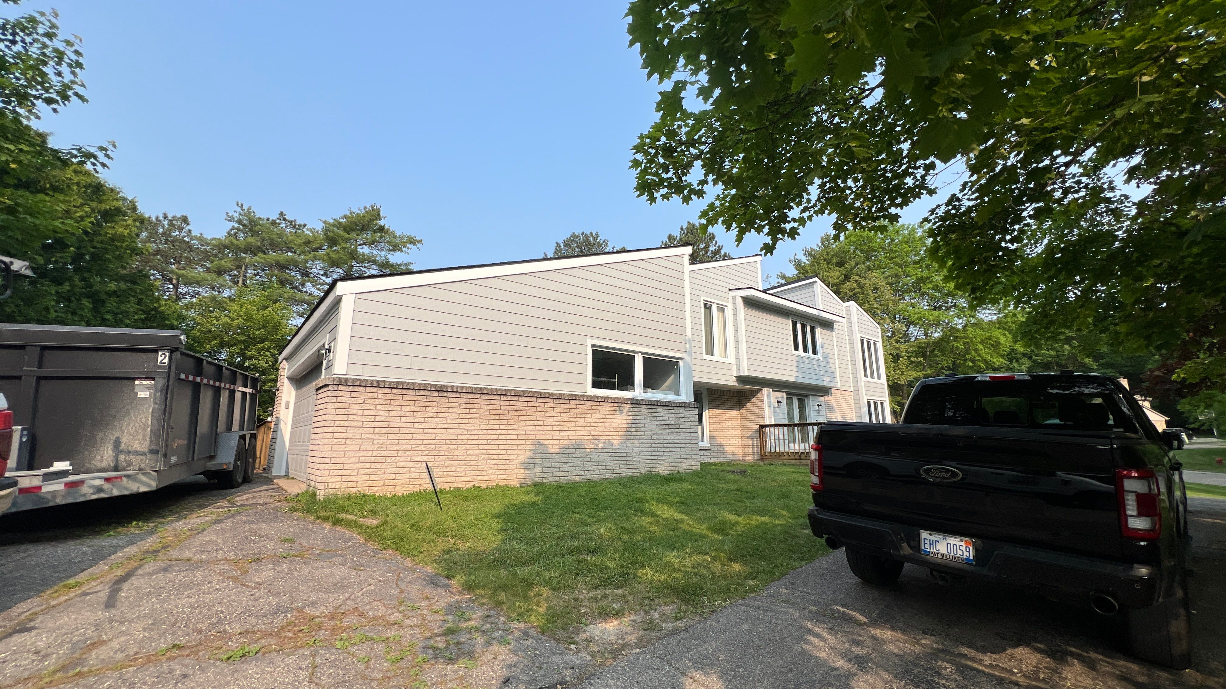 James Hardie Siding Replacement by Bloomfield Construction & Restoration